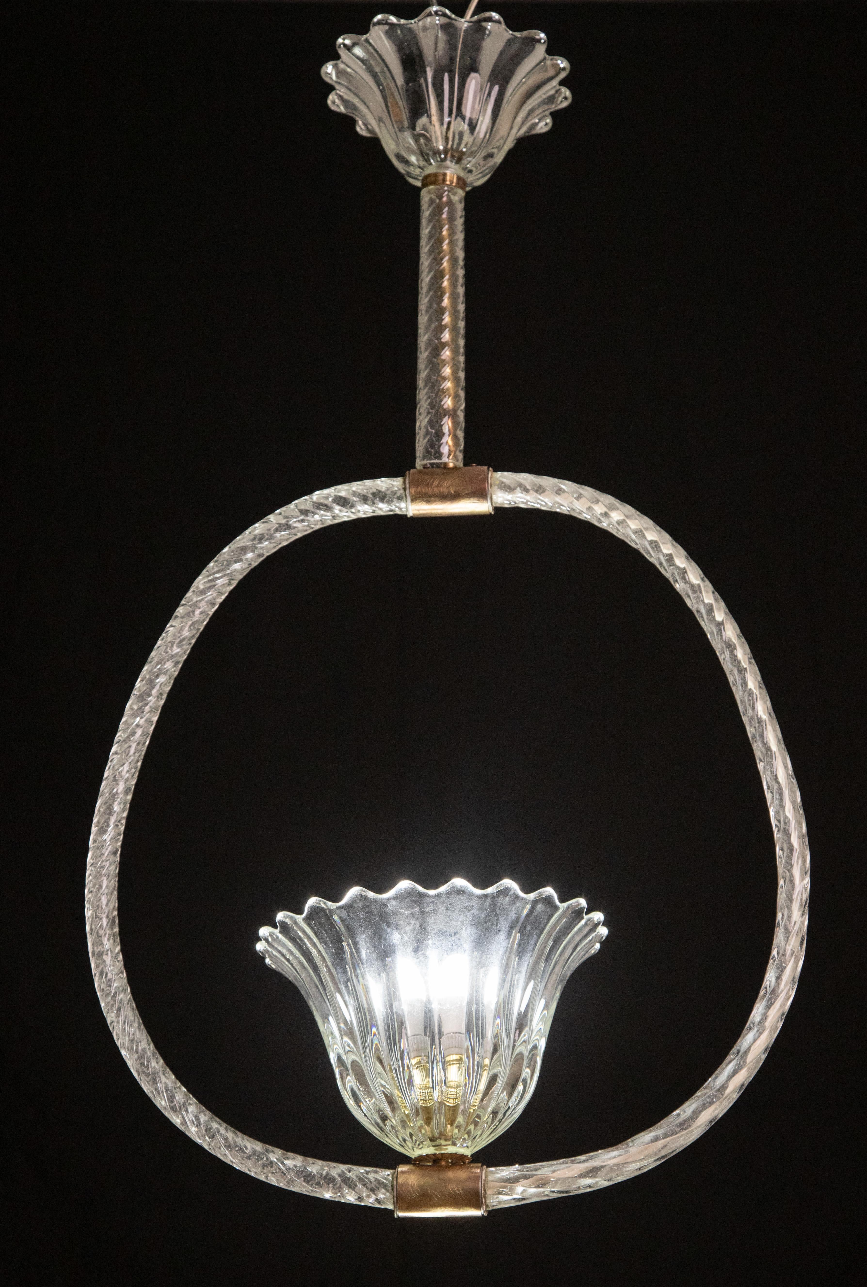 Stunning and unique rare pair of Barovier and Toso pendants.
Set of 2 small pendant lamp by Barovier & Toso, hand-blown, with brass fittings. The chandelier is 76 cm high, 43 cm wide.
The fixture requires a European E27 / 110 Volt Edison bulb, up