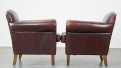 Set of 2 beautiful, finely finished design armchairs made of sheepskin