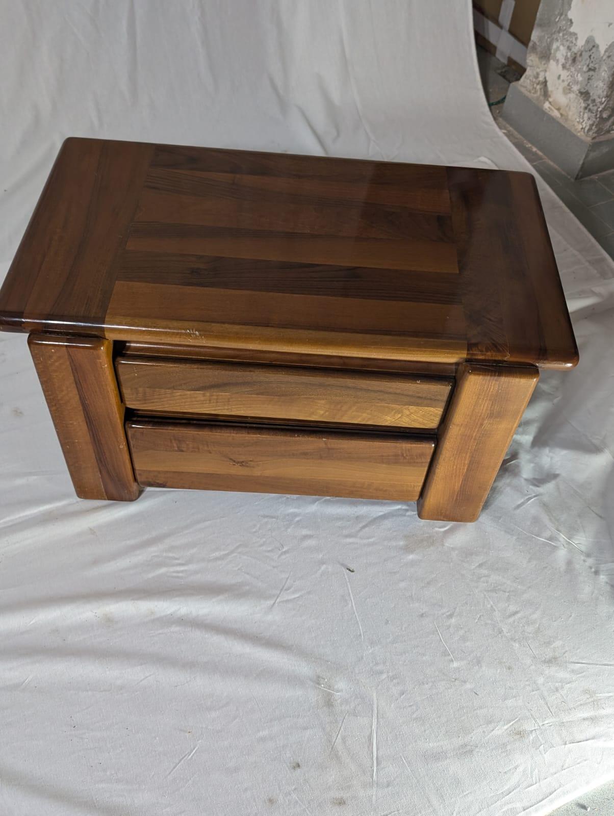 Introducing this set of 2 Walnut Bedside tables created by famous architect and designer Mario Marenco and produced by renowned Italian furniture firm Mobilgirgi in the 1970s. These refined masterpieces showcase an elegant appeal, courtesy of their