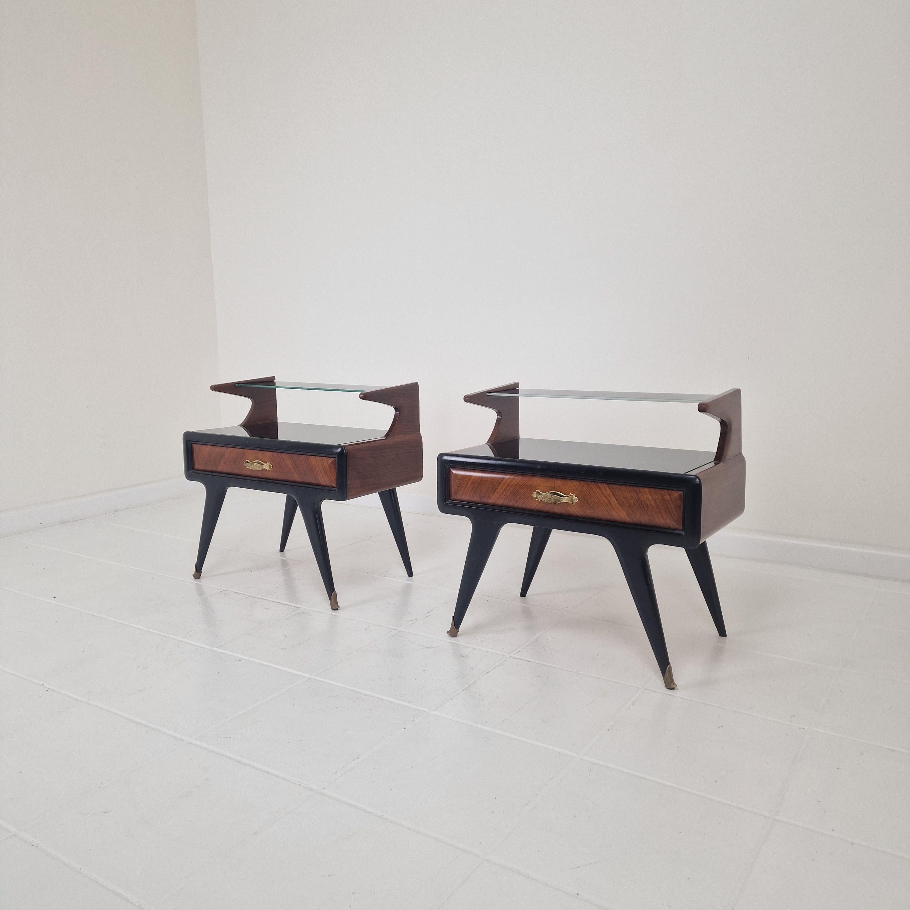 Beautiful pair of bedside tables / nightstands in the style of or attributed to Paolo Buffa (1903-1970).
They are made in Italy in the 50's. 

This lovely set is made with passion by the best craftsman, regarding the beautiful details.
They feature