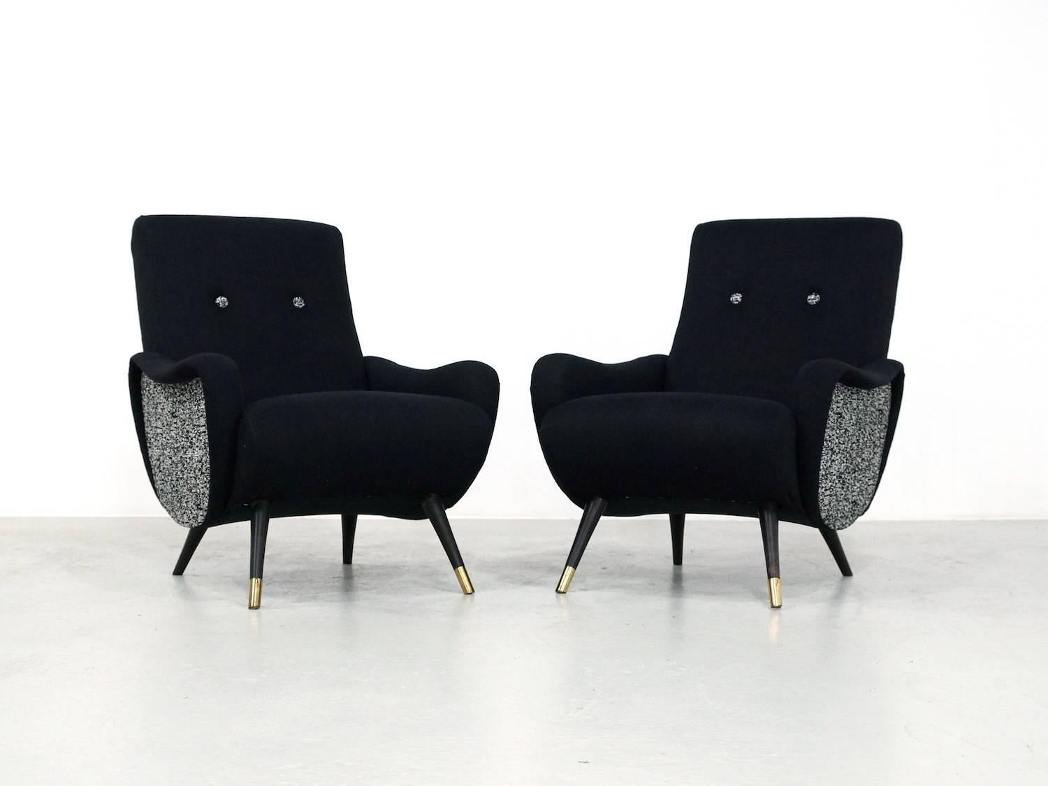 Great set of two easy chairs from Belgium. The chairs have a great shape and are completely restored, so springs seat have new bands, seat and back have new foam and of course new black tissue and white black tissue on the sides. The shape is a