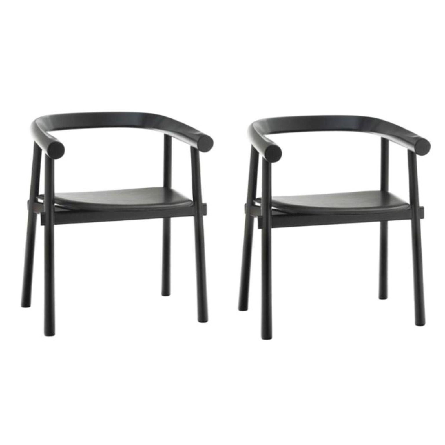 Set of 2 Black Bridge Altay armchairs by Patricia Urquiola
Materials: Structure in natural solid beech varnished or black lacquered. Seat in full-grain black leather
Technique: Lacquered and black stained wood and natural leather. 
Dimensions: W
