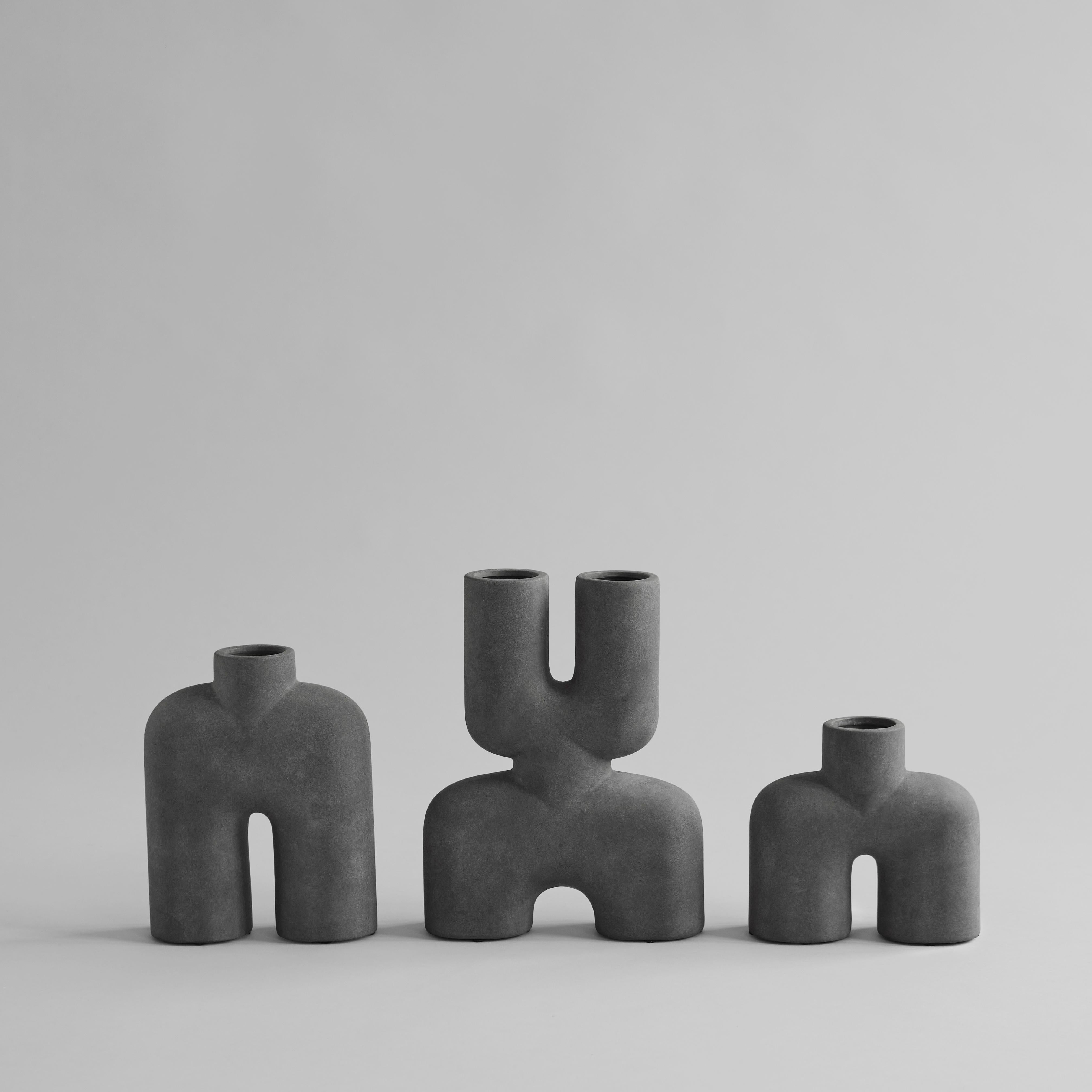Black Cobra tall mini by 101 Copenhagen
Designed by Kristian Sofus Hansen & Tommy Hyldahl
Dimensions: L18 / W6,5 / H23 CM
Materials: Ceramic

A tribute to the Cobra Arts Movement of the 1960s, the collection is the epitome of quirky vases that