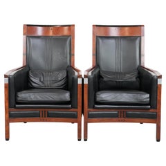 Set of 2 black cowhide Art Deco design armchairs with high backs by Schuitema