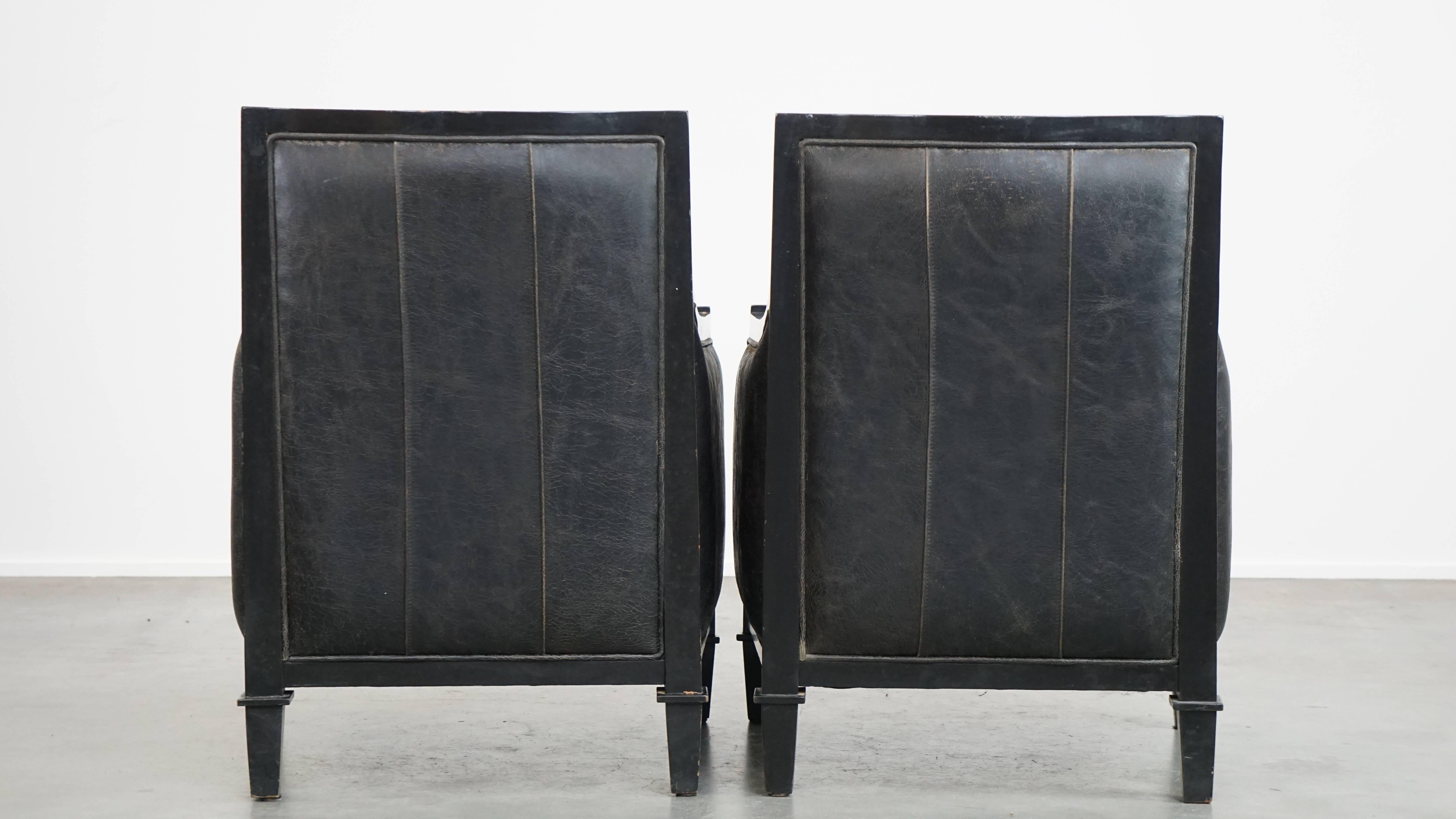 Hand-Crafted Set of 2 black cowhide leather and wooden armchairs with an Art Deco design For Sale