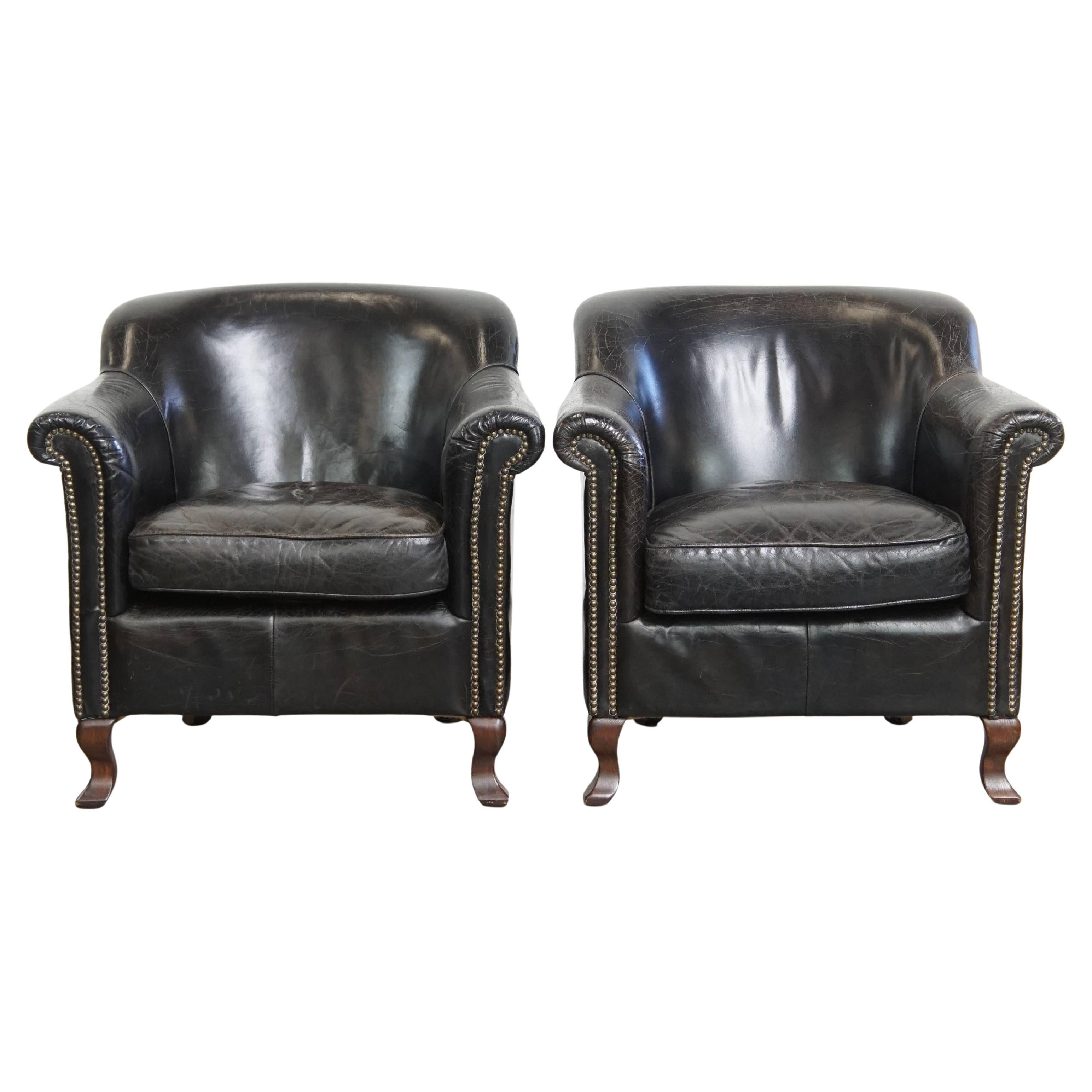 Set de 2  sillones de piel de vaca granulada negra
