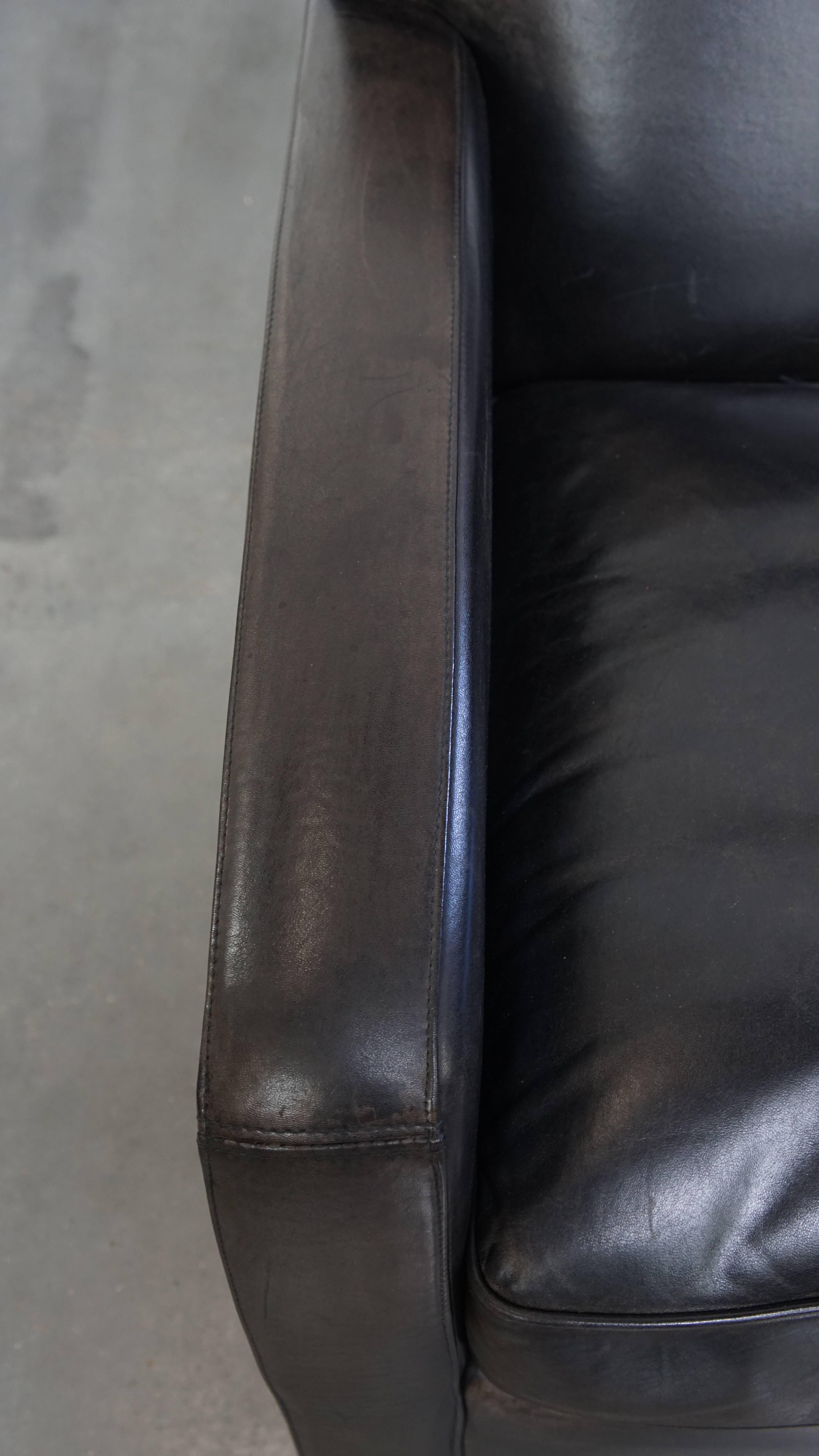 Set aus 2 schwarz/grauen Sesseln im Schafsfell-Design (Leder) im Angebot