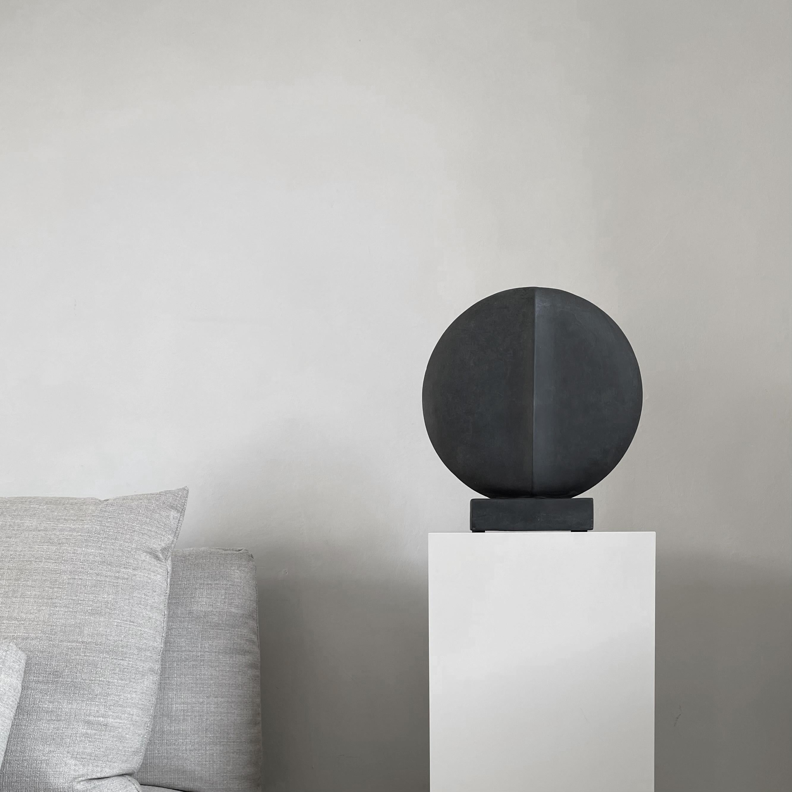 A set of 2 black Guggenheim mini by 101 Copenhagen
Designed by Kristian Sofus Hansen & Tommy Hyldahl
Dimensions: L 32 / W 7 / H 34 CM
Materials: Ceramic

Guggenheim is a series of sculptural ceramic vases based on archetypal geometry. The