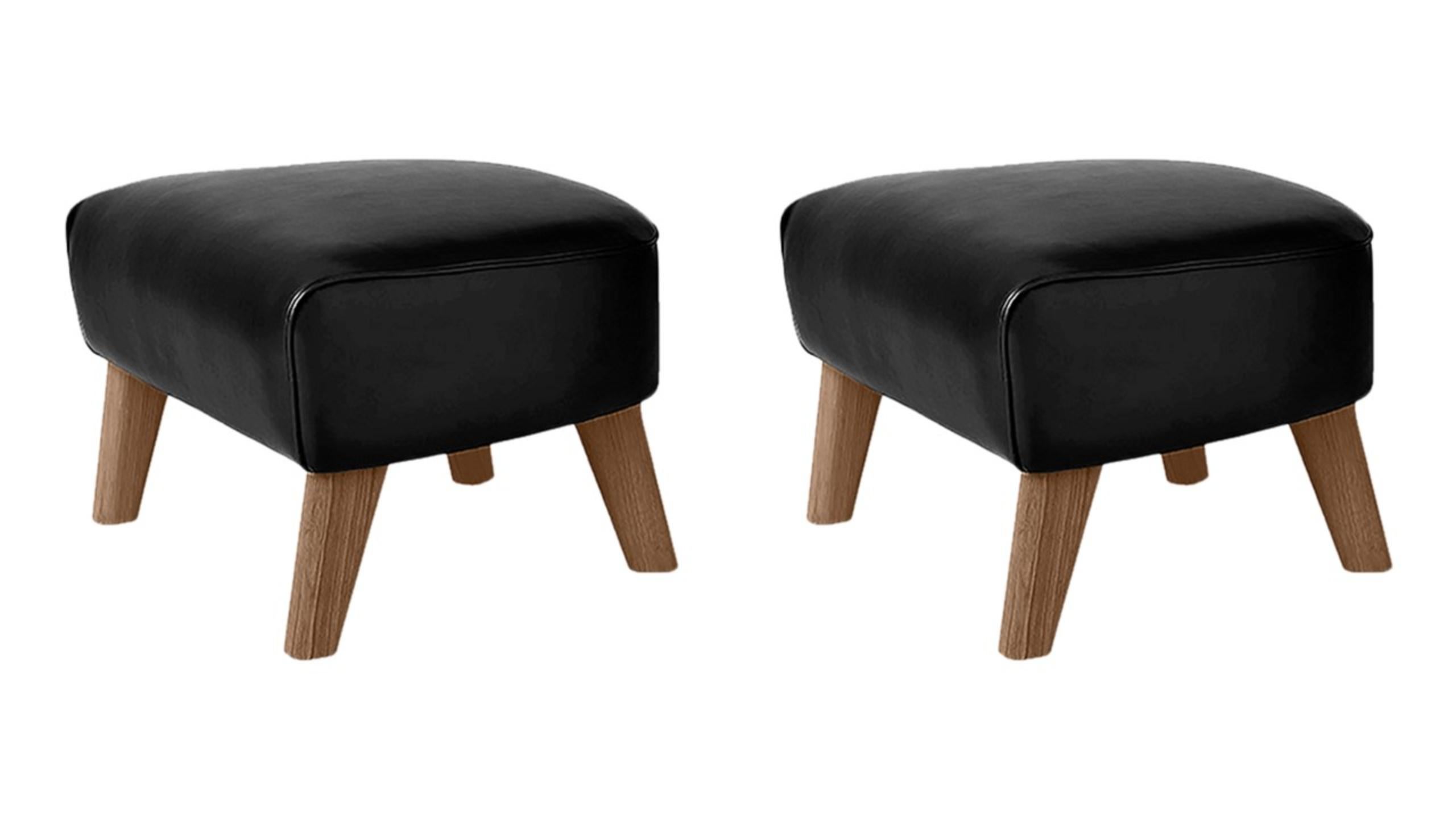 Set of 2 Black Leather and Smoked Oak My Own Chair footstools by Lassen
Dimensions: W 56 x D 58 x H 40 cm 
Materials: Leather

The My Own Chair Footstool has been designed in the same spirit as Flemming Lassen’s original iconic chair, reflecting