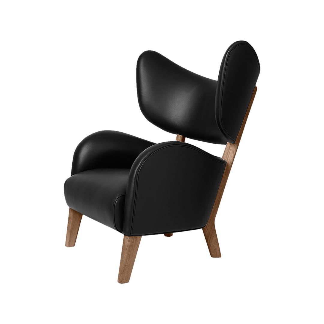 Set Of 2 Black Leather Smoked Oak My Own Chair Lounge Chairs by Lassen
Dimensions: W 88 x D 83 x H 102 cm 
Materials: Leather

Flemming Lassen's iconic armchair from 1938 was originally only made in a single edition. First, the then