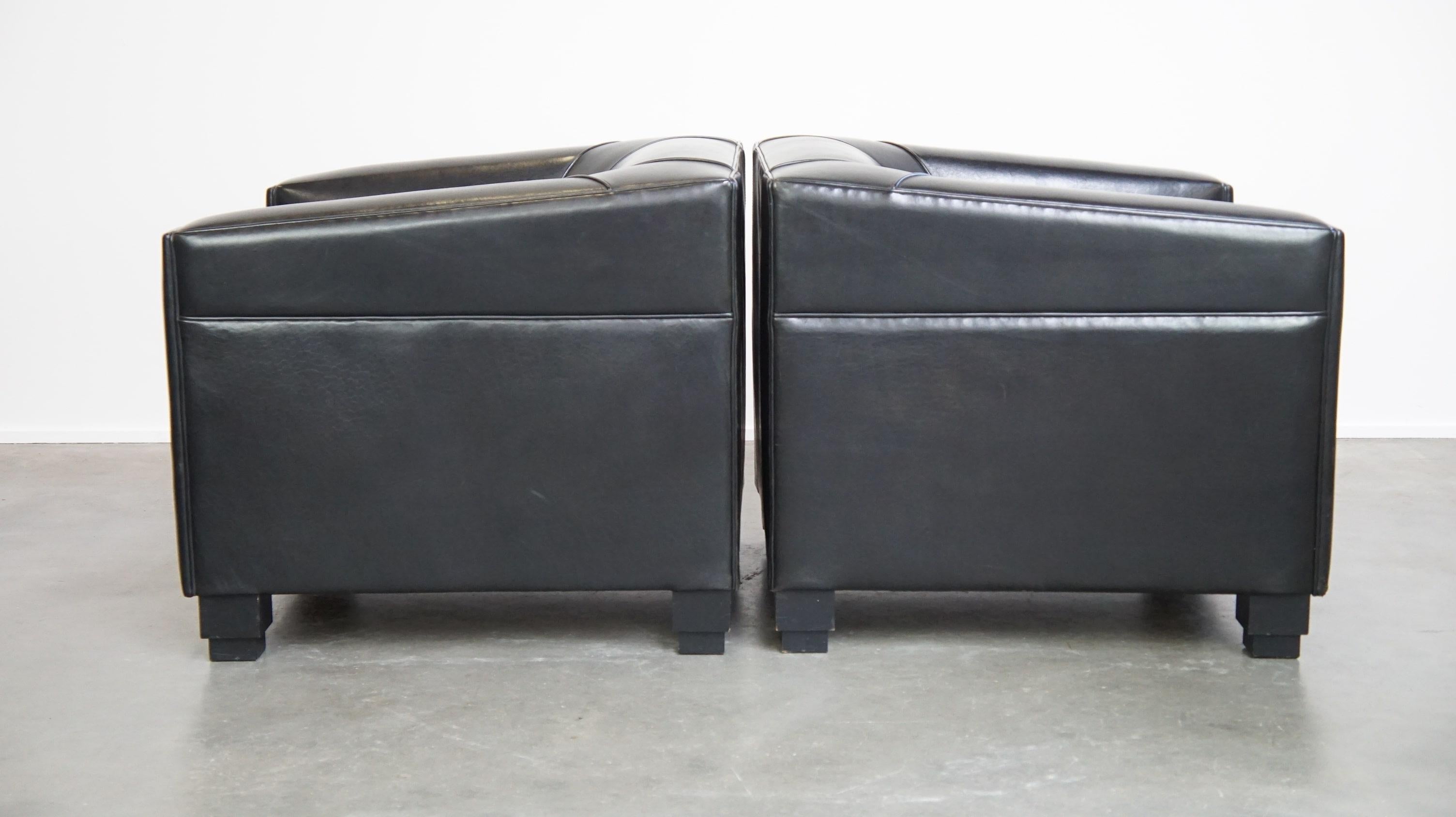 Set di 2 poltrone in pelle di pecora nera dal design Art Déco e dall'elevato comfort di seduta In condizioni buone in vendita a Harderwijk, NL