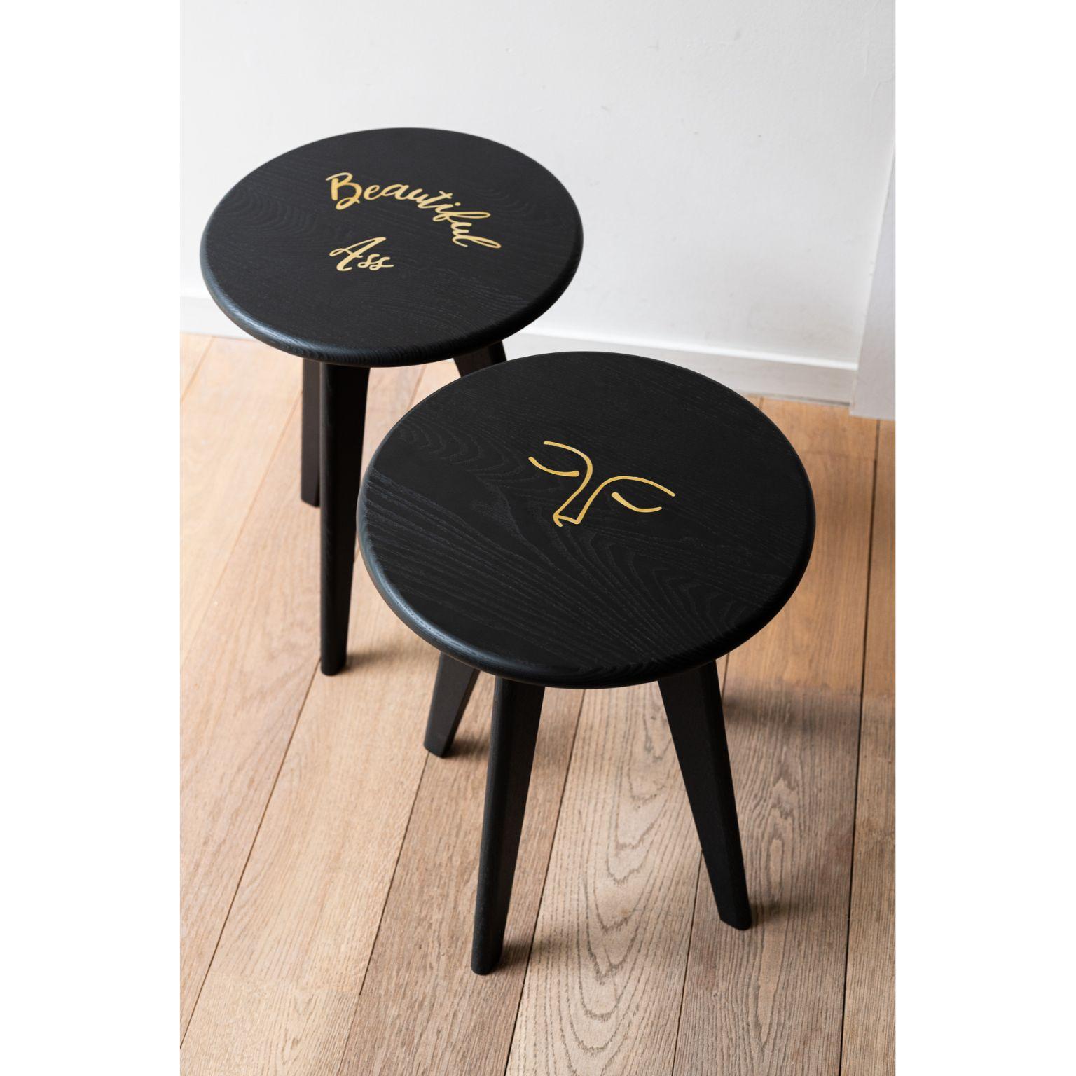 Set of 2 Black Stained Ash ASSY Stool by Mademoiselle Jo
Dimensions: Ø 35 x H 43 cm (each).
Materials: Ash wood and brass inlay.

Available in two wood colors and several designs.  Please contact us.

At the border between design and goldsmithing,