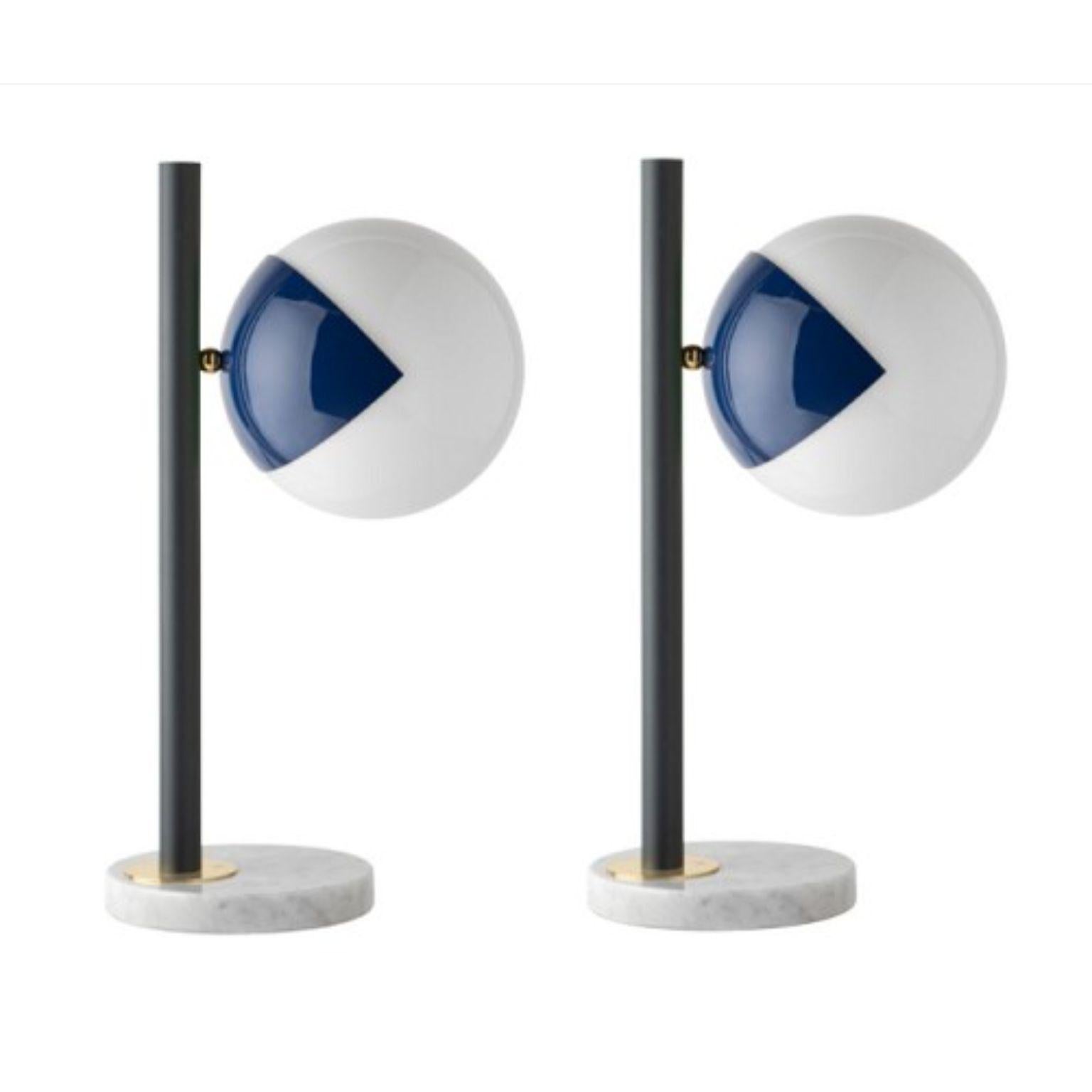 Blue dimmable table lamp pop-up black by Magic Circus Editions.
Dimensions: Ø 22 x 30 x 53 cm .
Materials: carrara marble base, smooth brass tube, glossy mouth blown glass.

All our lamps can be wired according to each country. If sold to the