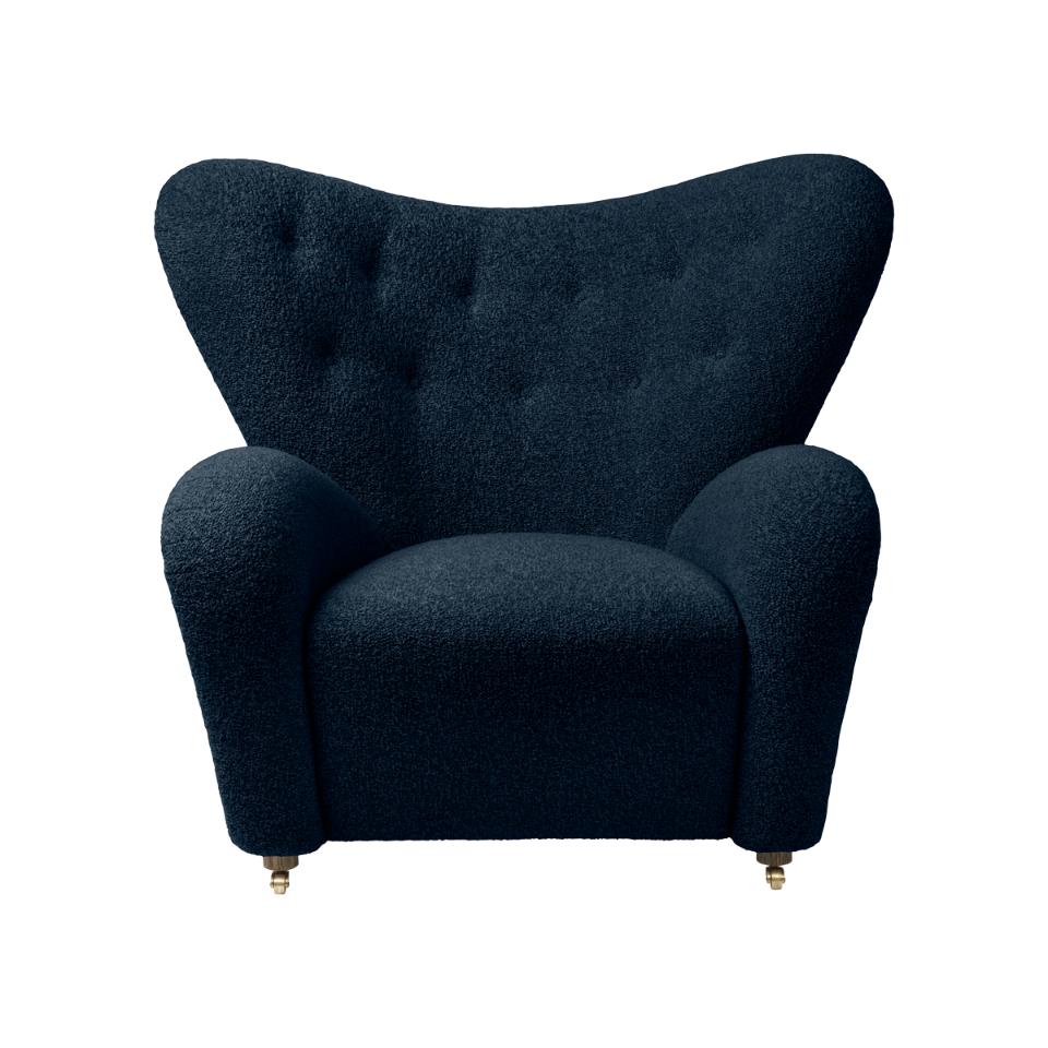 Set of 2 blue Sahco Zero the tired man lounge chairs by Lassen
Dimensions: W 102 x D 87 x H 88 cm 
Materials: Sheepskin

Flemming Lassen designed the overstuffed easy chair, The Tired Man, for The Copenhagen Cabinetmakers’ Guild Competition in