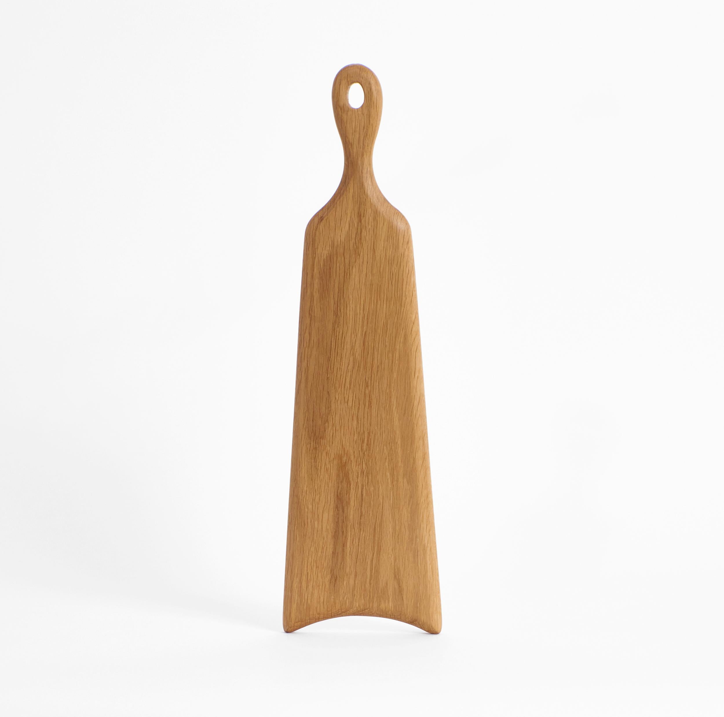Set of 2 board 54 in Oak by Project 213A
Dimensions: D 54.5 x W 15 x H 2 cm
Materials: Oak wood.

This long shaped board is hand-carved from oak. The boards as an individual or as part of the family will become a key item in every kitchen being