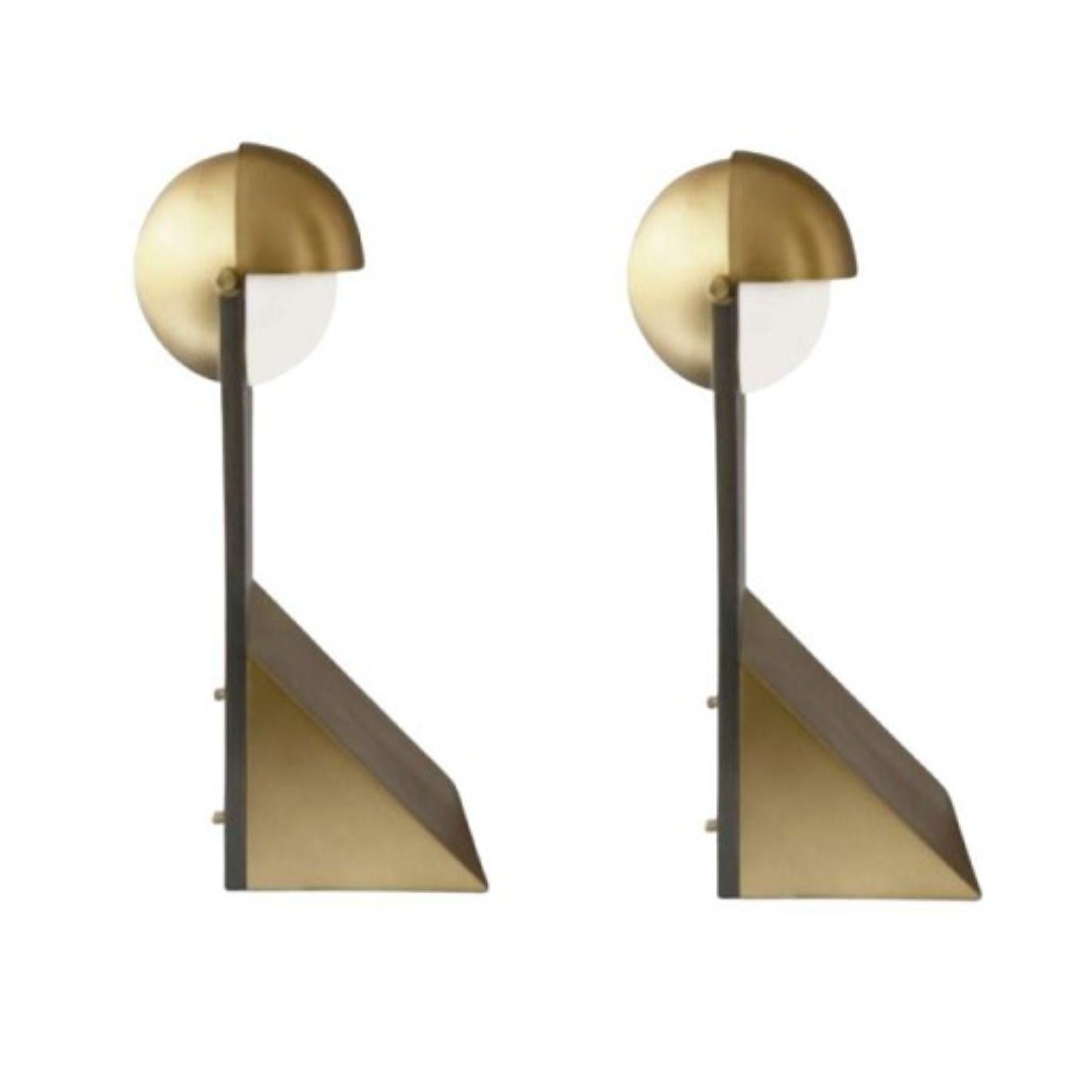 Set of 2 brass dance of geometry table lamps by square in circle
Dimensions: H48 x W14 x D18 cm
Materials: Brushed brass , Bbrushe grey Metal

Inspired by costumes from The Bauhaus Ballet, this triadic table lamp design utilizes the three