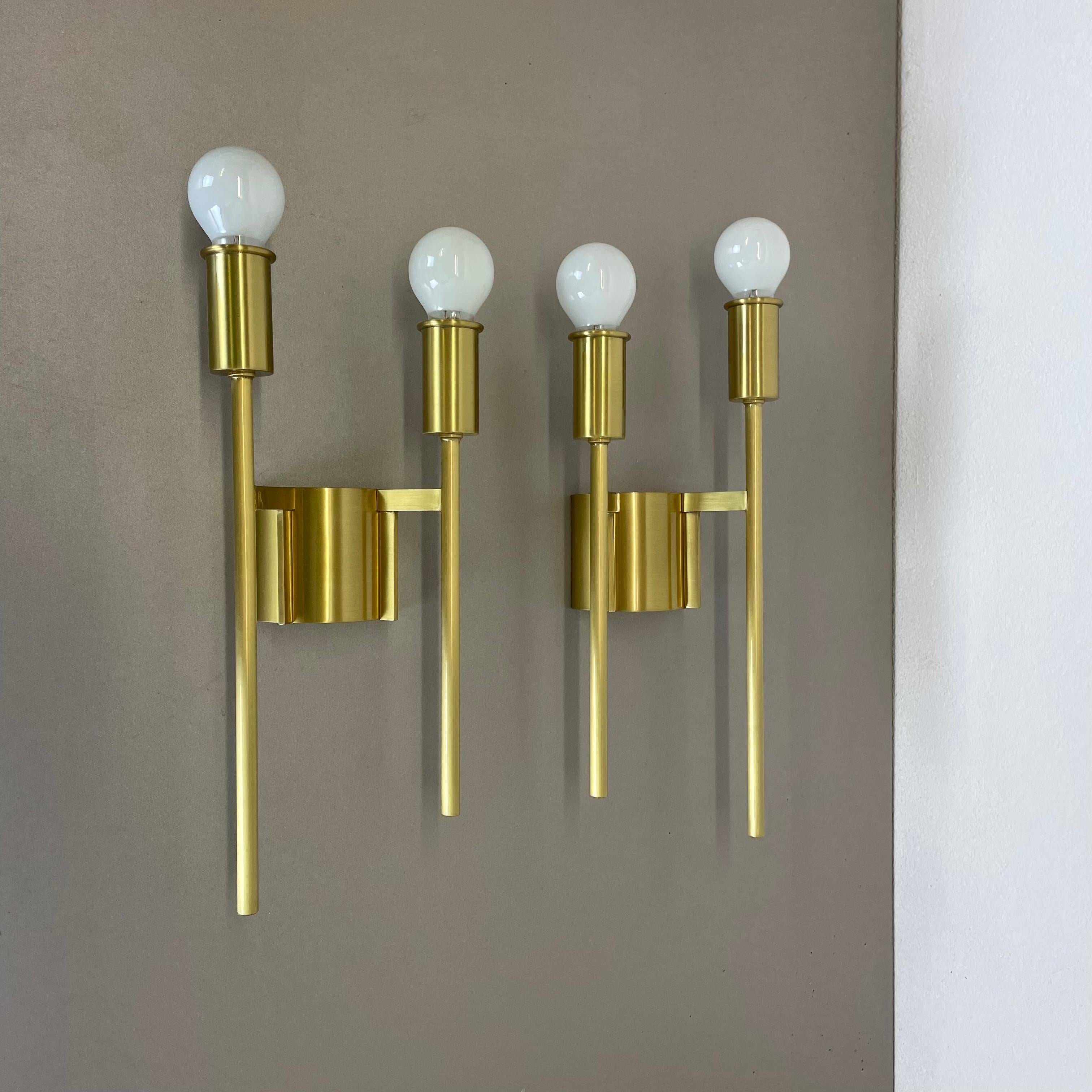 Article:

Wall light, set of 2


Origin:

Italy in the manner of Stilnovo, Gio Ponti



Age:

1970s



This modernist light set was produced in Italy in the 1970s in Italy. It is made of brass and features a very unique and unusual Brutalist form