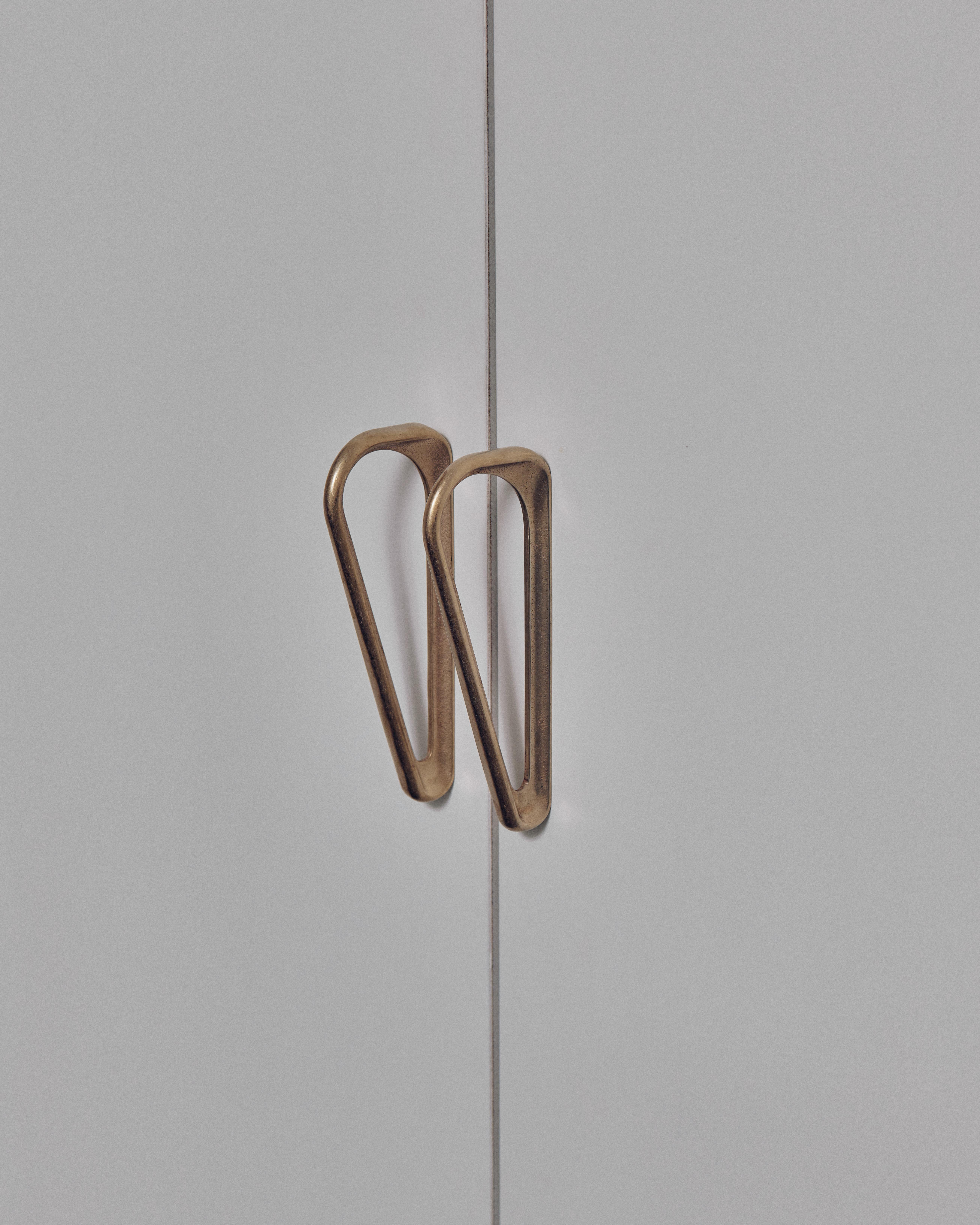 Set of 2 Brass Planchart Handles by Henry Wilson
Dimensions: W 2 x D 8 x H 19 cm
Materials: Brass

Brass Planchart Handle to suit cabinetry and doors.

Each piece is sand cast and rumbled finished.

Aluminium Planchart Handles are bold and unique.