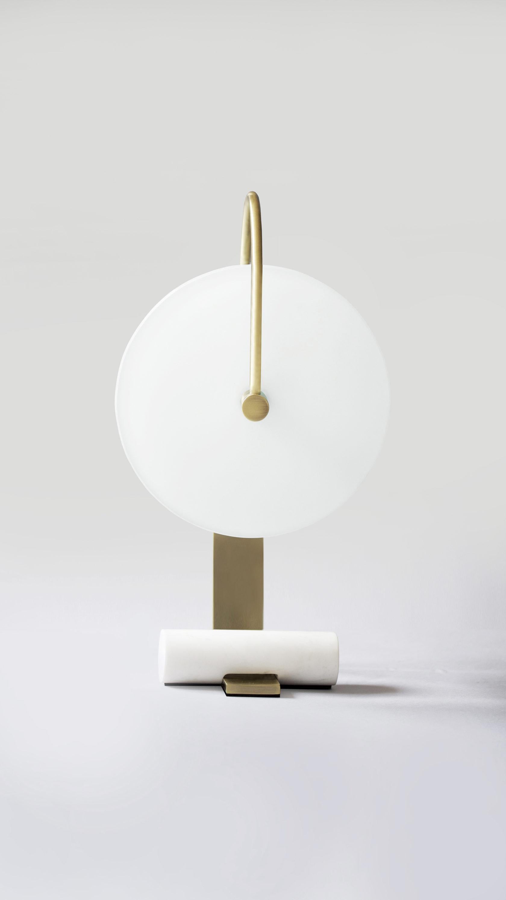 Set of 2 Brass Universe Table Lamps by Square in Circle
Dimensions: H 43.5 x W 19 x D 7 cm
Materials: Brushed brass, white frosted glass, white onyx marble

Our glass disc light provides an ambient glow and is held in place by a single, arched arm