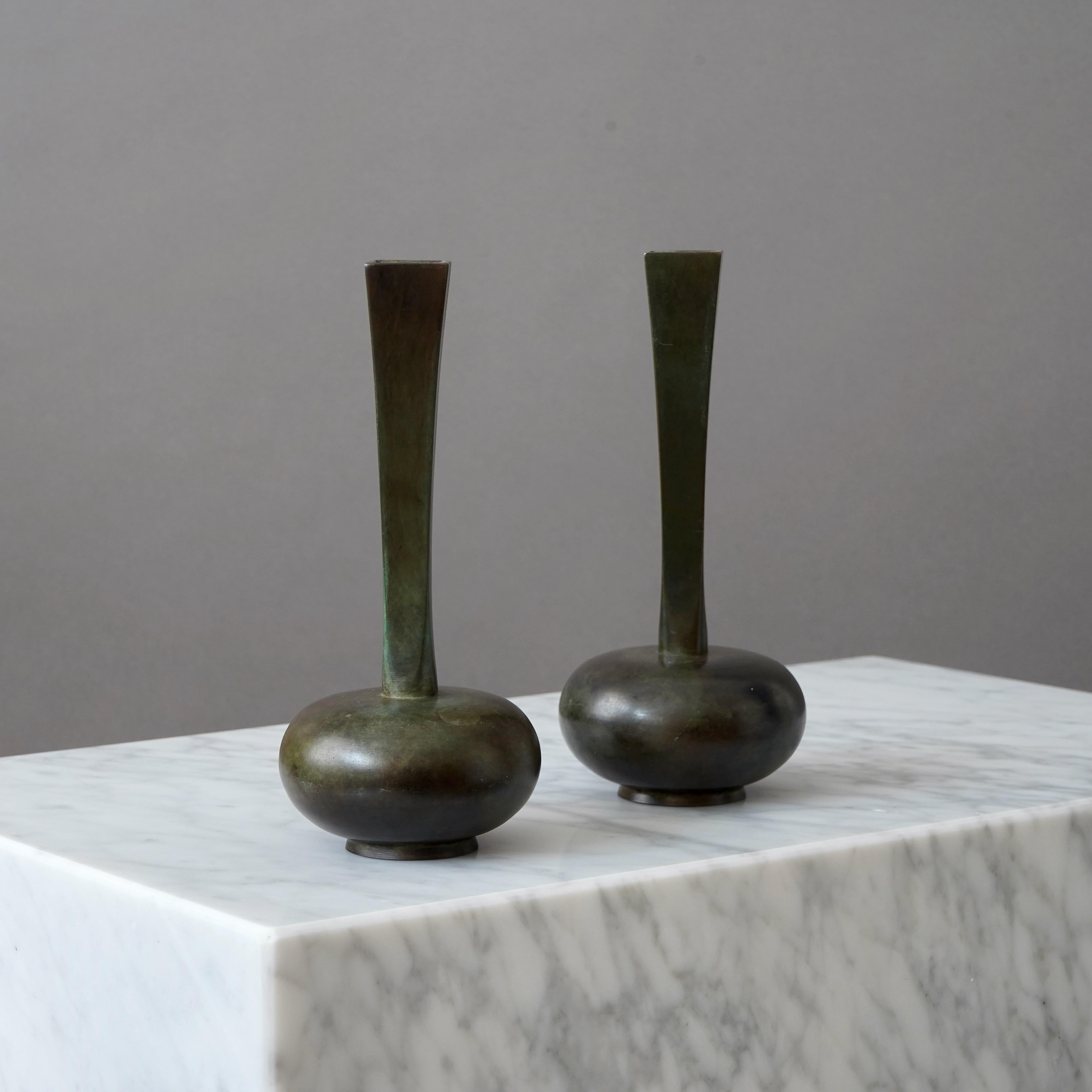 A set of 2 beautiful bronze vases with amazing patina. 
Made by GAB Guldsmedsaktiebolaget, Sweden, 1930s.  

Great condition, with a few light scratches.
Stamped 'BRONS' and makers mark.