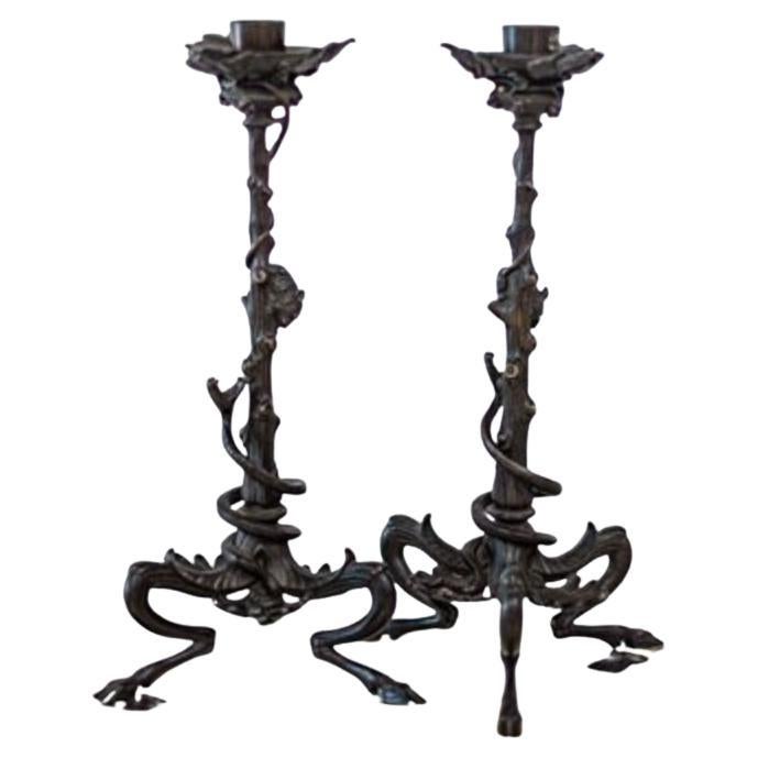 Ensemble de 2 bougeoirs en bronze par Victor Paillard en vente