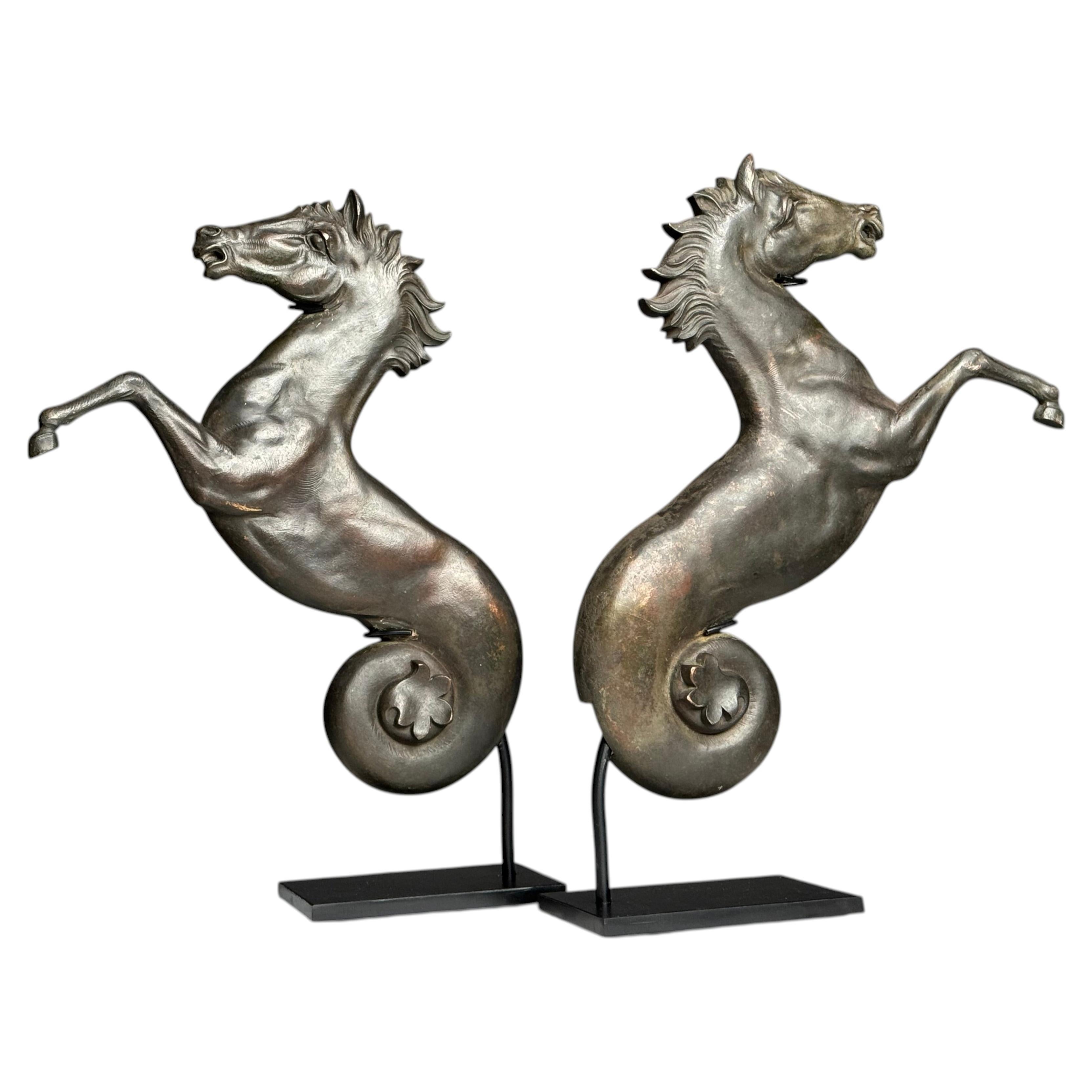 Set of 2 bronze seahorses on a stand