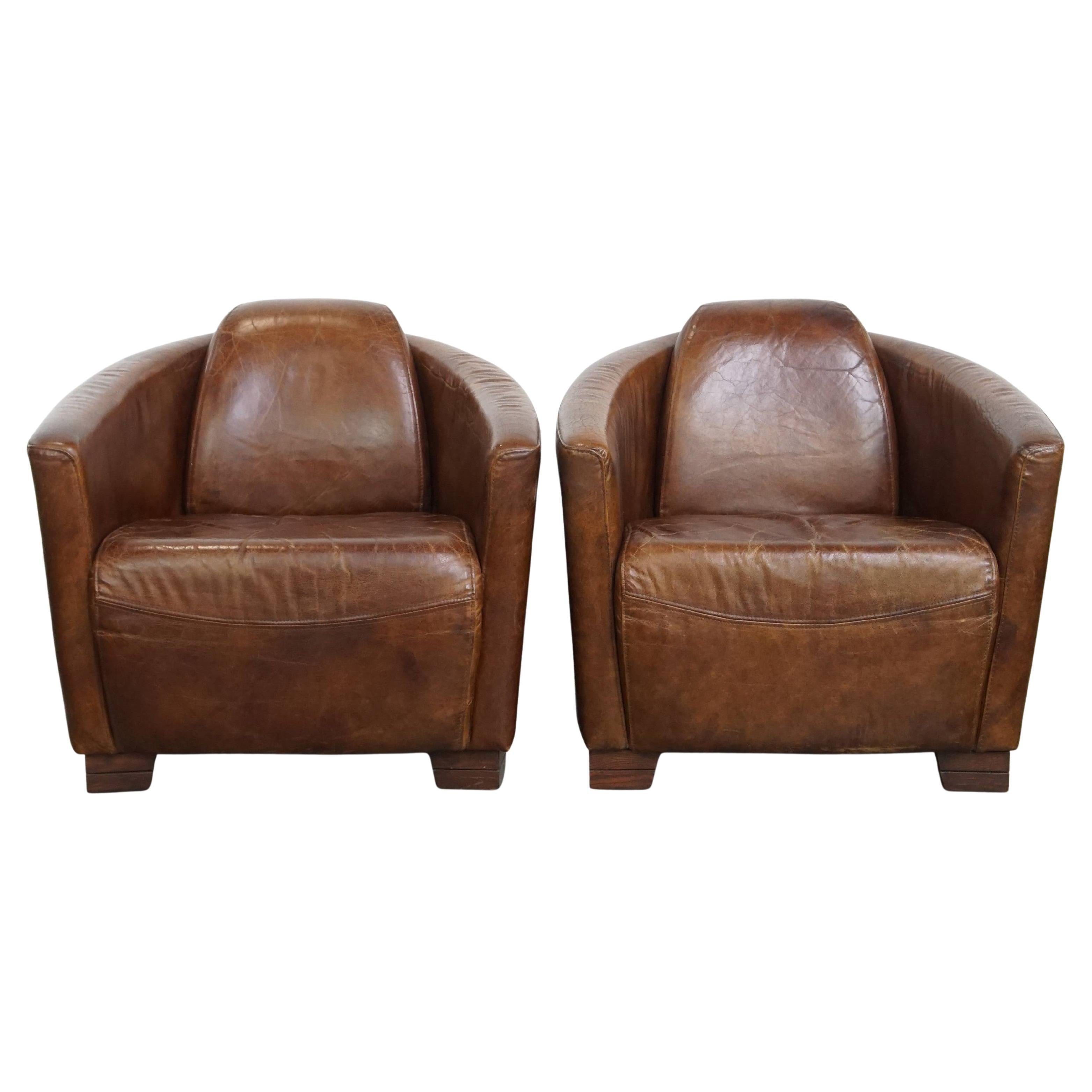 Set of 2 brown cowhide leather Aviator design armchairs For Sale