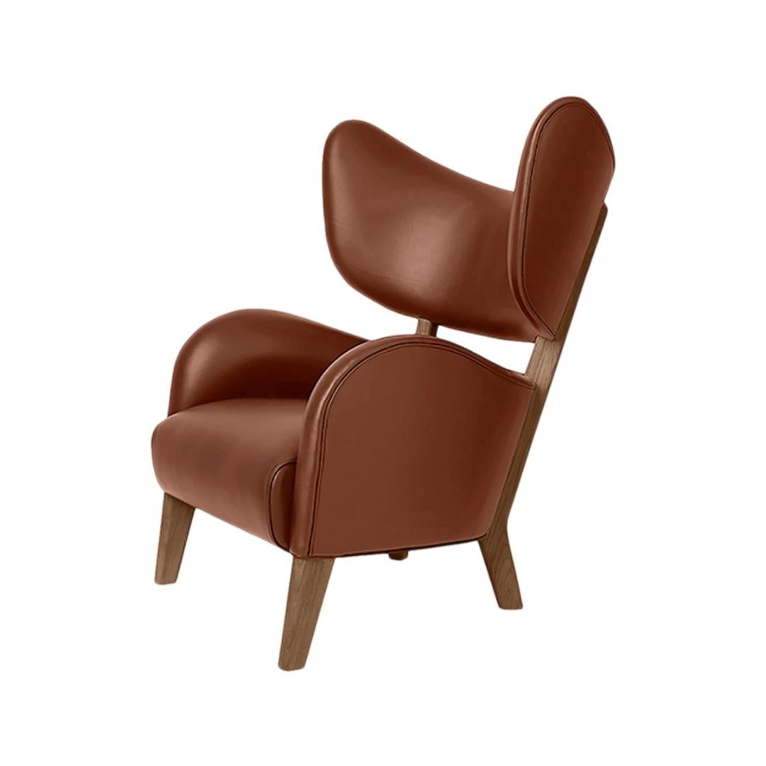 Set of 2 brown leather smoked oak my own chair lounge chairs by Lassen
Dimensions: W 88 x D 83 x H 102 cm 
Materials: leather

Flemming Lassen's iconic armchair from 1938 was originally only made in a single edition. First, the then
