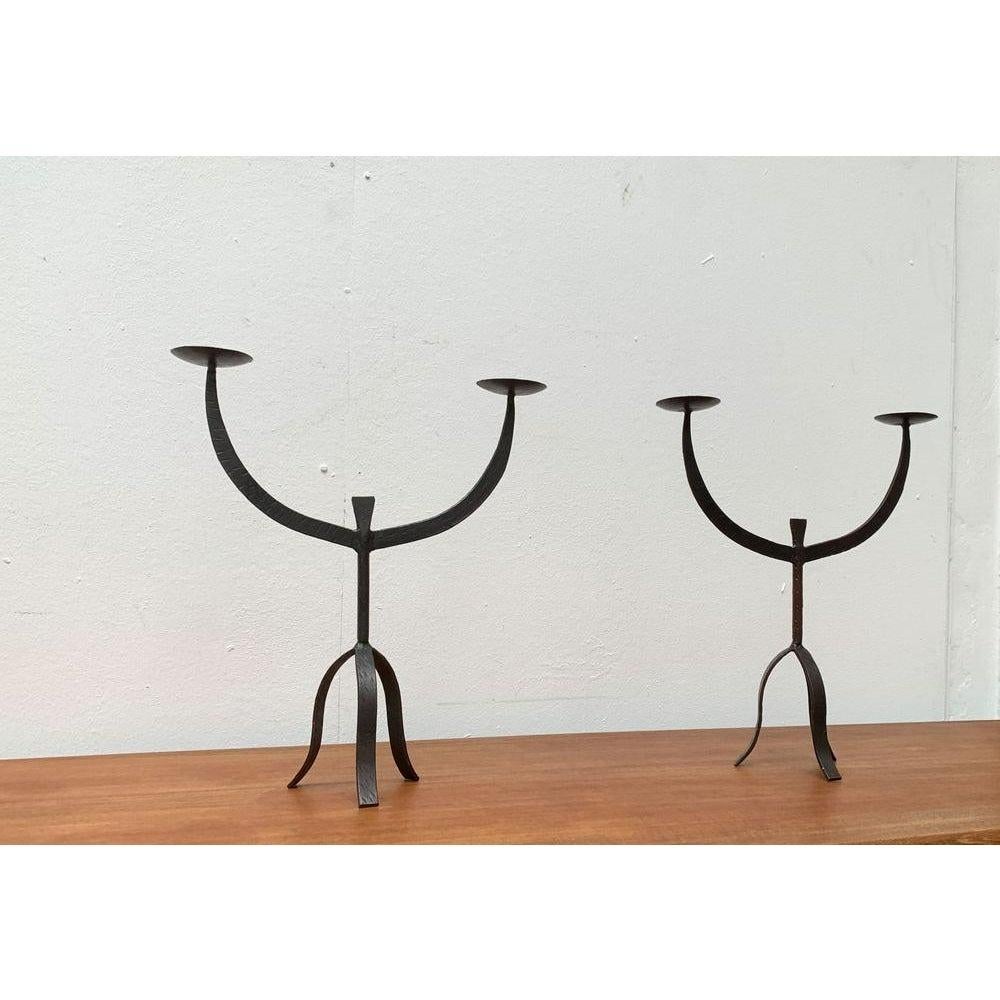 Brutalist Wrought Iron Candleholders, 1960s, Set of 2, in Very Good conditions. Designed 1960 to 1969.

Additional information:
Material: Metal
Color: Black
Styles: Brutalist, Mid-Century Modern
Item Type: Vintage, Antique or Pre-owned
Diamension: