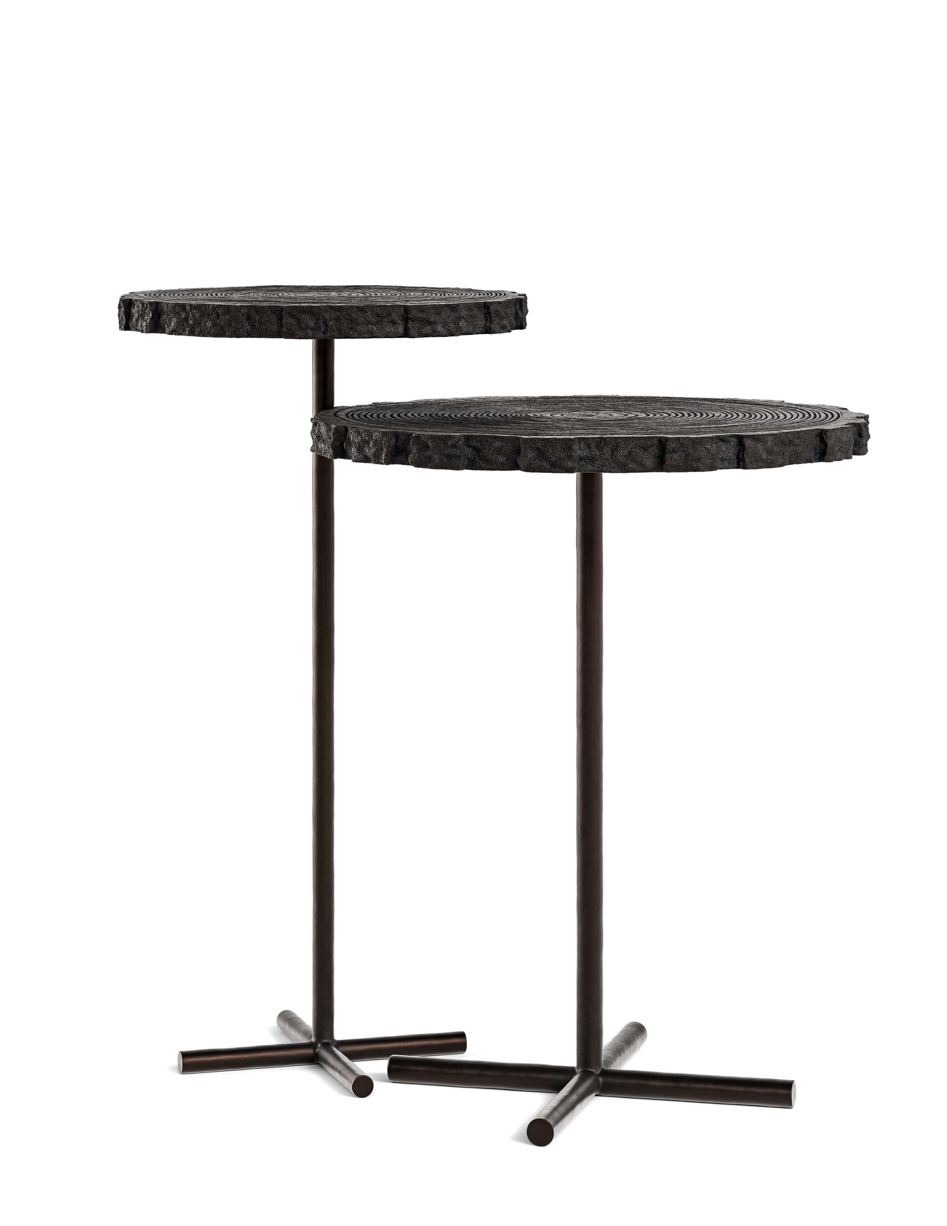 Discover the perfect fusion of functionality and sculptural beauty with our exceptional Cambium Nesting Tables, where space-saving design meets artisanal craftsmanship in elegant harmony.

Our Cambium Nesting Tables offer versatile sophistication