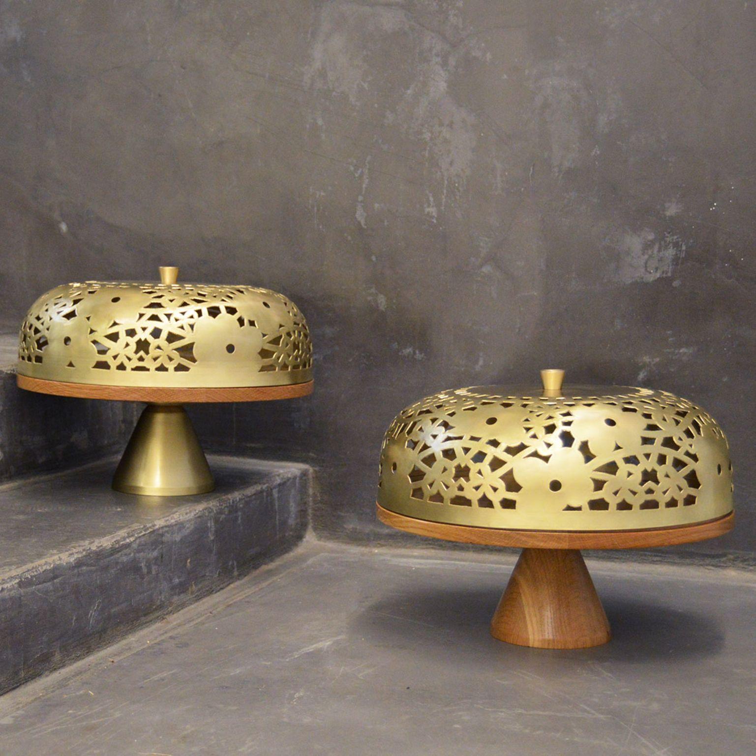 Set of 2 camille cake stands by Marc Dibeh
2014
Materials: French oak, brass
Dimensions: D 40 x H 35 cm 

Beirut based designer Marc Dibeh narrates his cultural environment through compelling interiors and products.
His studio’s philosophy