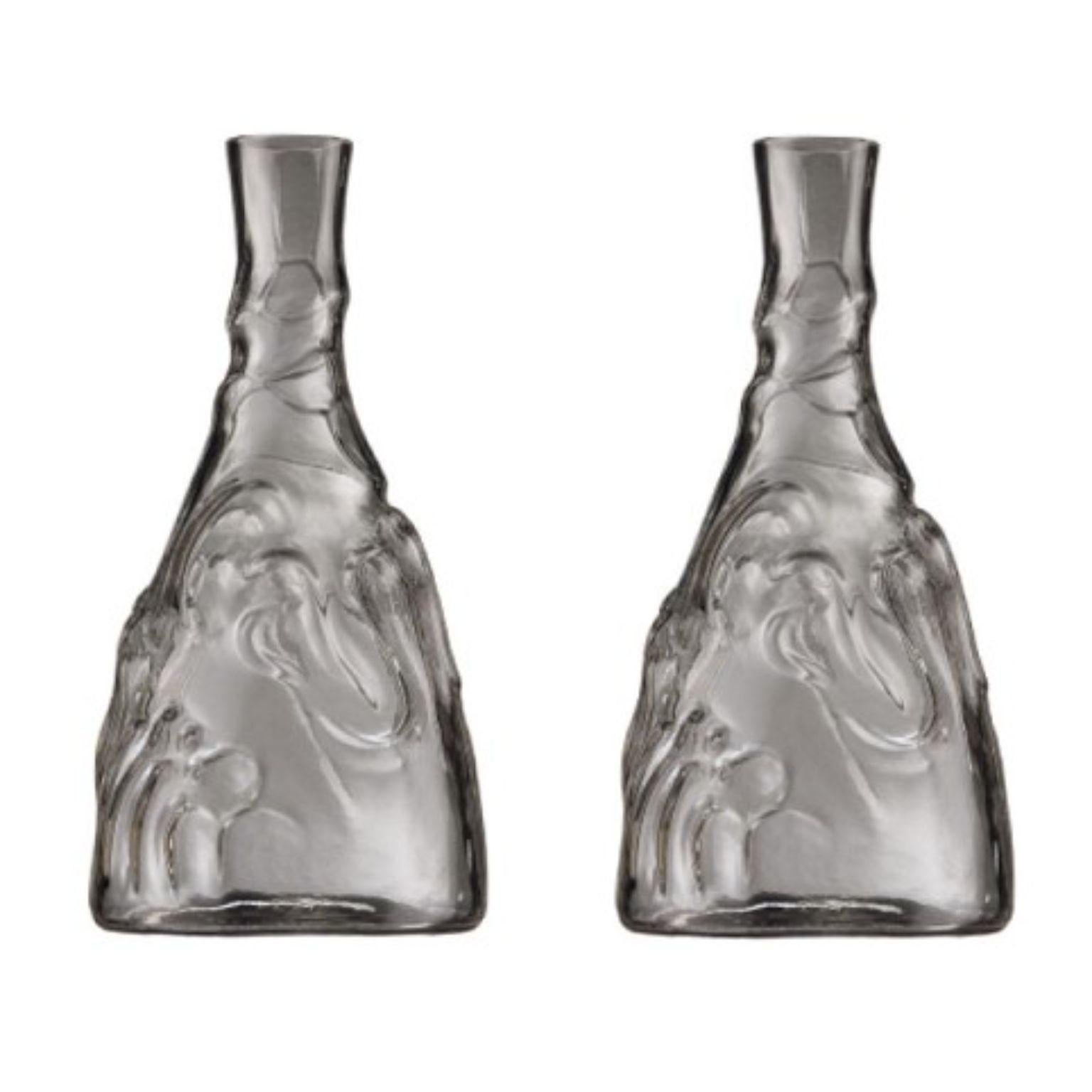 Set of 2 Casa de Familia Bottles by Josep Maria Jujol
Dimensions: diameter 13 x height 27 cm 
Materials: glass. 
Also available in blue glass. 


He designed the Casa de Familia Bottle in 1912, and more than a century later it’s still going