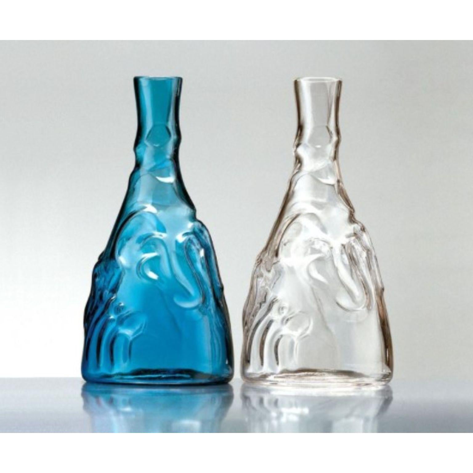 Set of Casa de Familia bottles by Josep Maria Jujol
Dimensions: Diameter 13 x Height 27 cm 
Materials: Glass. 


He designed the Casa de Familia Bottle in 1912, and more than a century later it’s still going strong. The architect Josep Maria