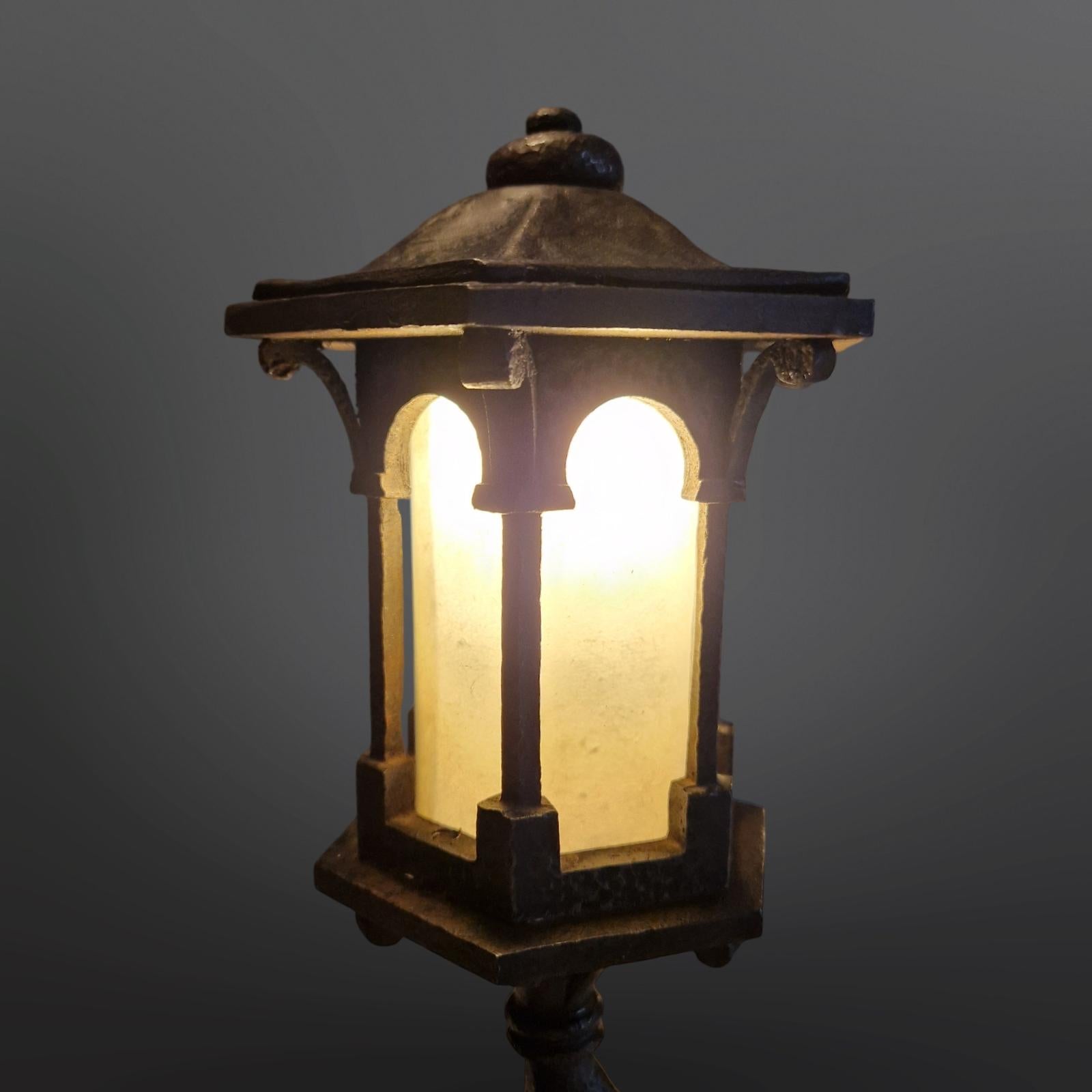 20th Century Set of 2 cast iron Griffin table lamps, Netherlands 1920s For Sale
