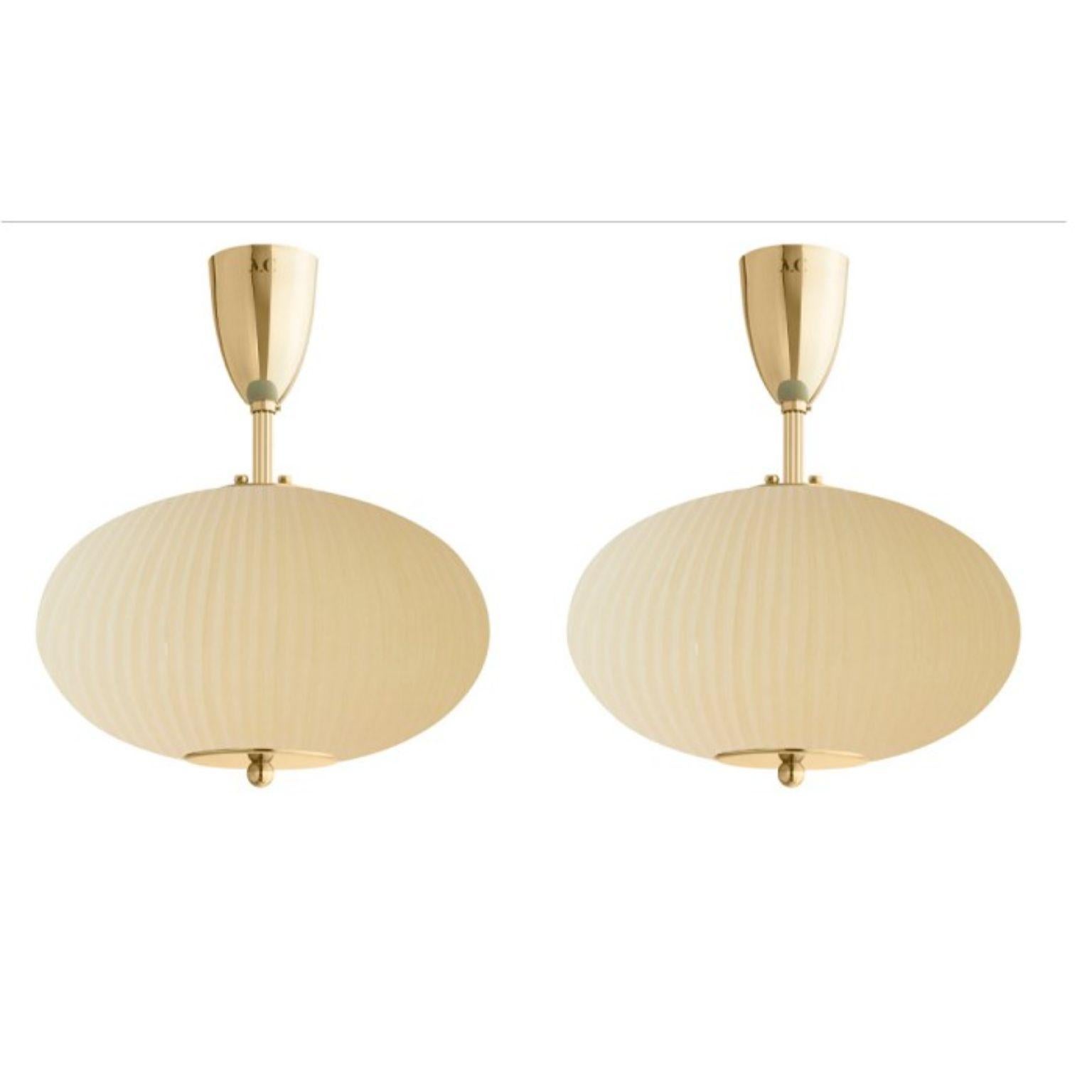 Ceiling lamp China 07 by Magic Circus Editions
Dimensions: H 40 x W 32 x D 32 cm
Materials: Brass, mouth blown glass sculpted with a diamond saw
Colour: mustard yellow

Available finishes: brass, nickel
Available colors: enamel soft white,