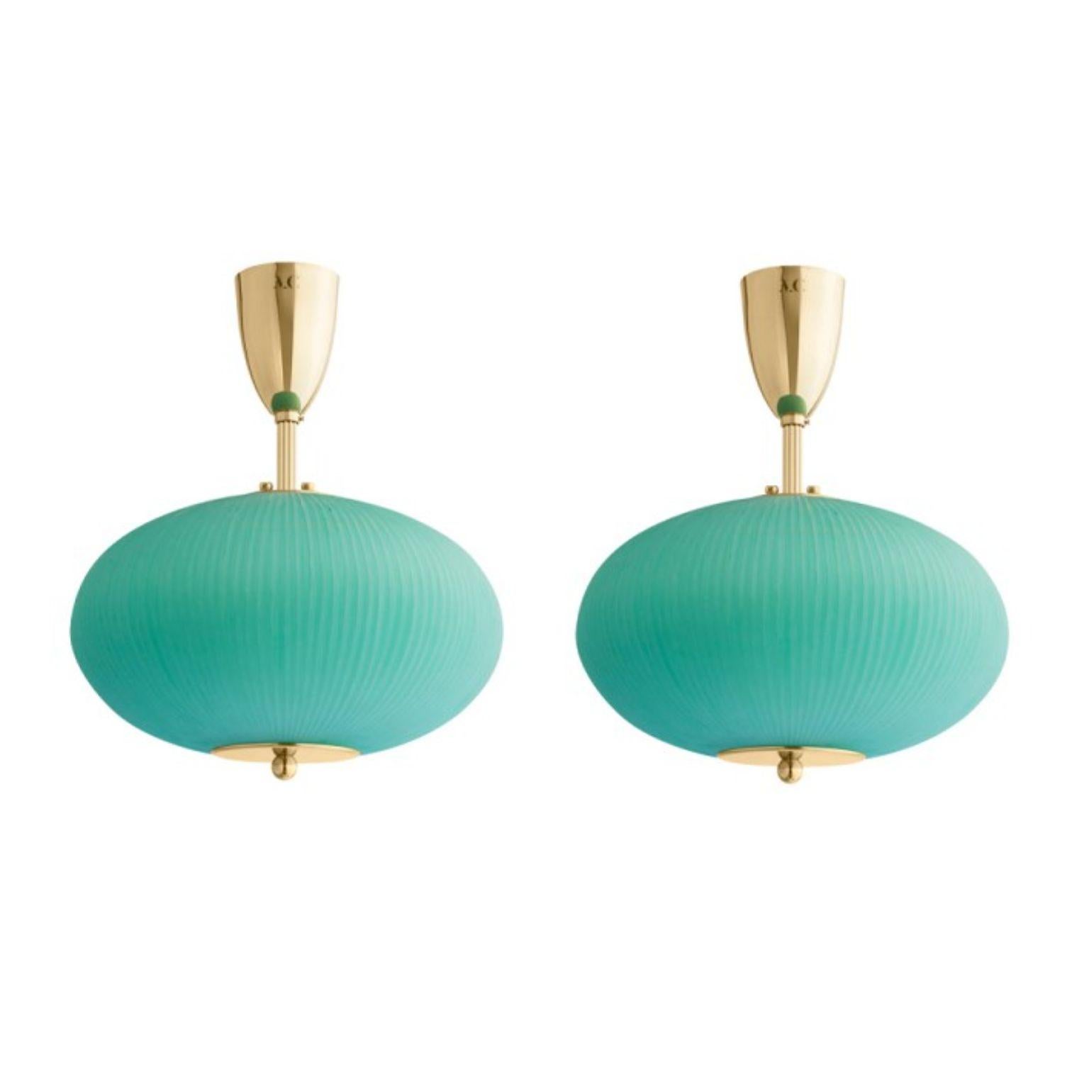 Ceiling lamp China 07 by Magic Circus Editions
Dimensions: H 40 x W 32 x D 32 cm
Materials: Brass, mouth blown glass sculpted with a diamond saw
Colour: jade green

Available finishes: Brass, nickel
Available colours: enamel soft white, soft