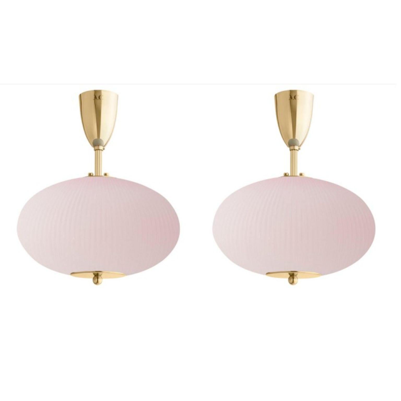Ceiling lamp China 07 by Magic Circus Editions
Dimensions: H 40 x W 32 x D 32 cm
Materials: Brass, mouth blown glass sculpted with a diamond saw
Colour: soft rose

Available finishes: Brass, nickel
Available colours: enamel soft white, soft