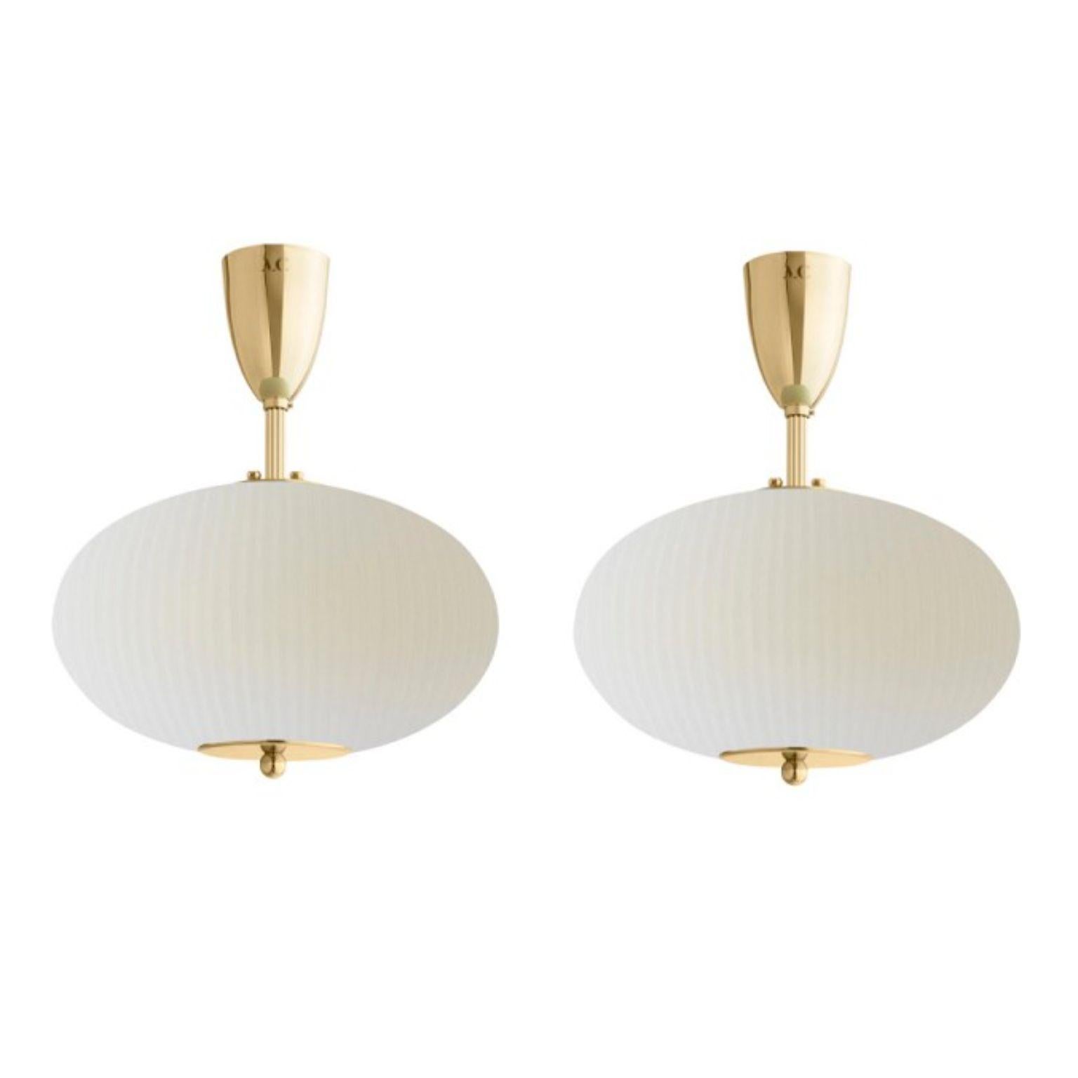 Ceiling lamp China 07 by Magic Circus Editions
Dimensions: H 40 x W 32 x D 32 cm
Materials: Brass, mouth blown glass sculpted with a diamond saw
Colour: ivory

Available finishes: Brass, nickel
Available colours: enamel soft white, soft rose, jade