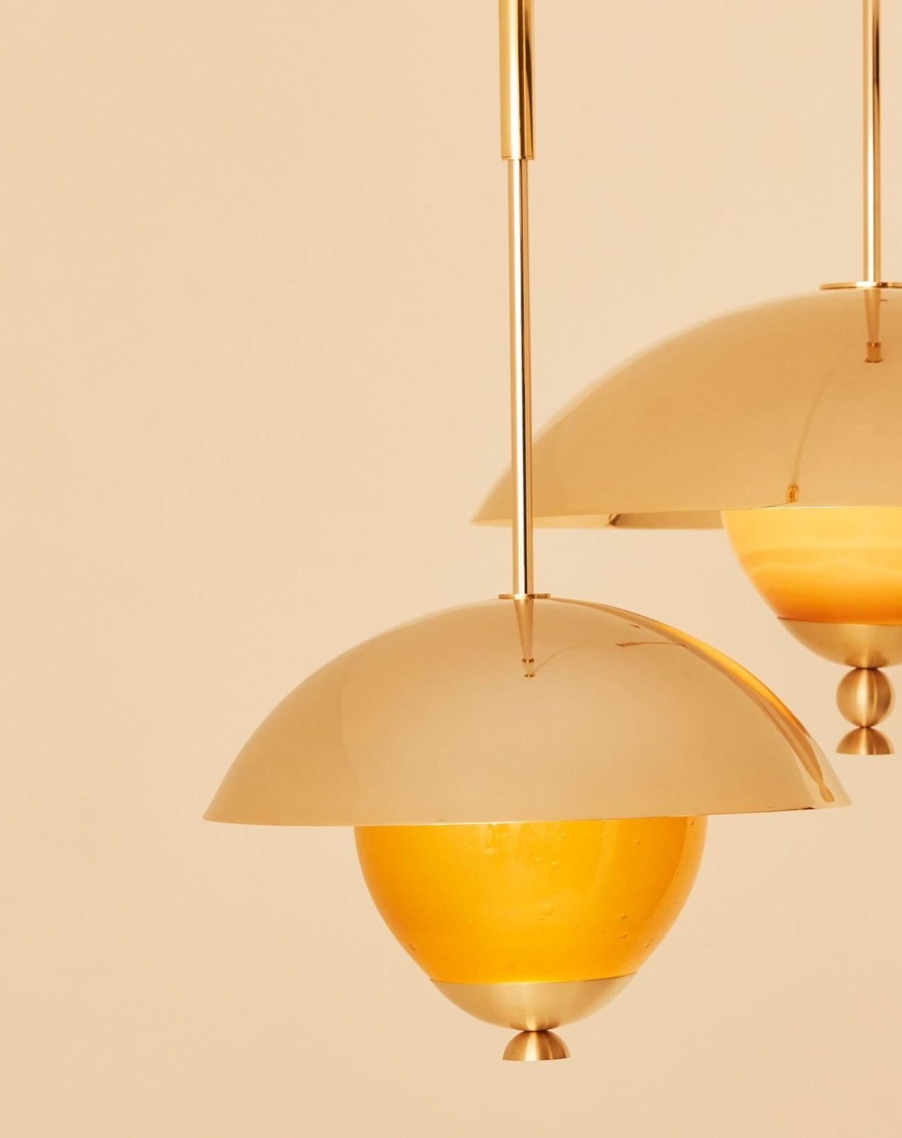 Set of 2 Celeste pendant light by Mydriaz.
Dimensions: S : diam 40 x prof 28 cm
 L : diam 60 x prof 34 cm
Materials: Brass, glass
Finishes: Golden-plated polished brass, white nickel finish on polished brass, Black nickel finish on polished