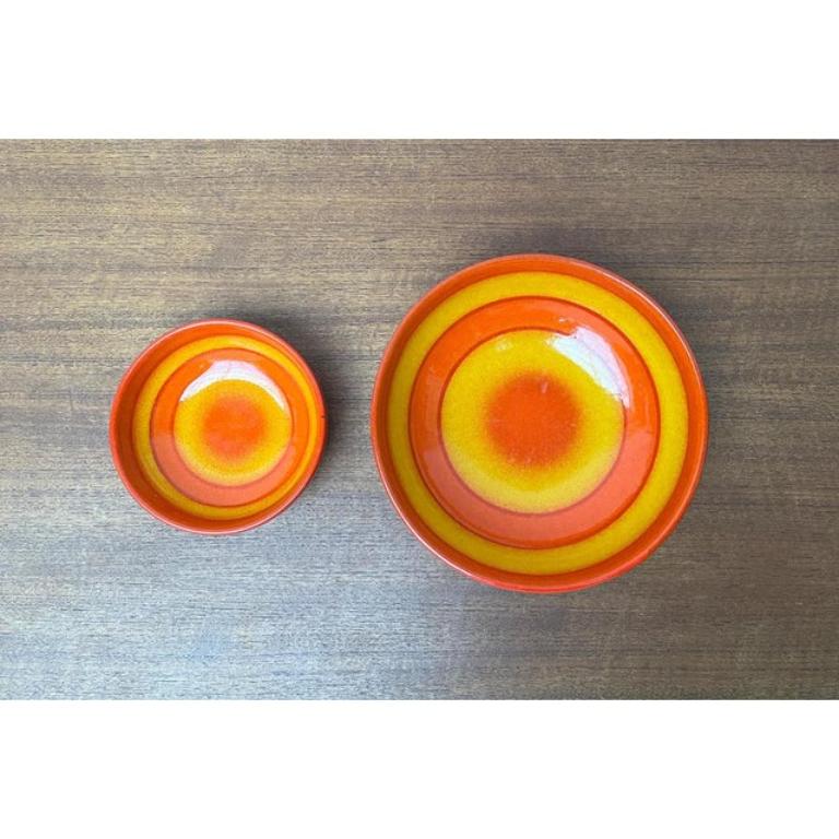 Ceramic Bowls from Baldelli, Italy, Set of 2, in Very Good conditions. Designed 1970 to 1979 This piece has an attribution mark.

Additional information:
Materials: Ceramic
Country of Origin: Italy
Color: Orange
Item Type: Vintage, Antique or