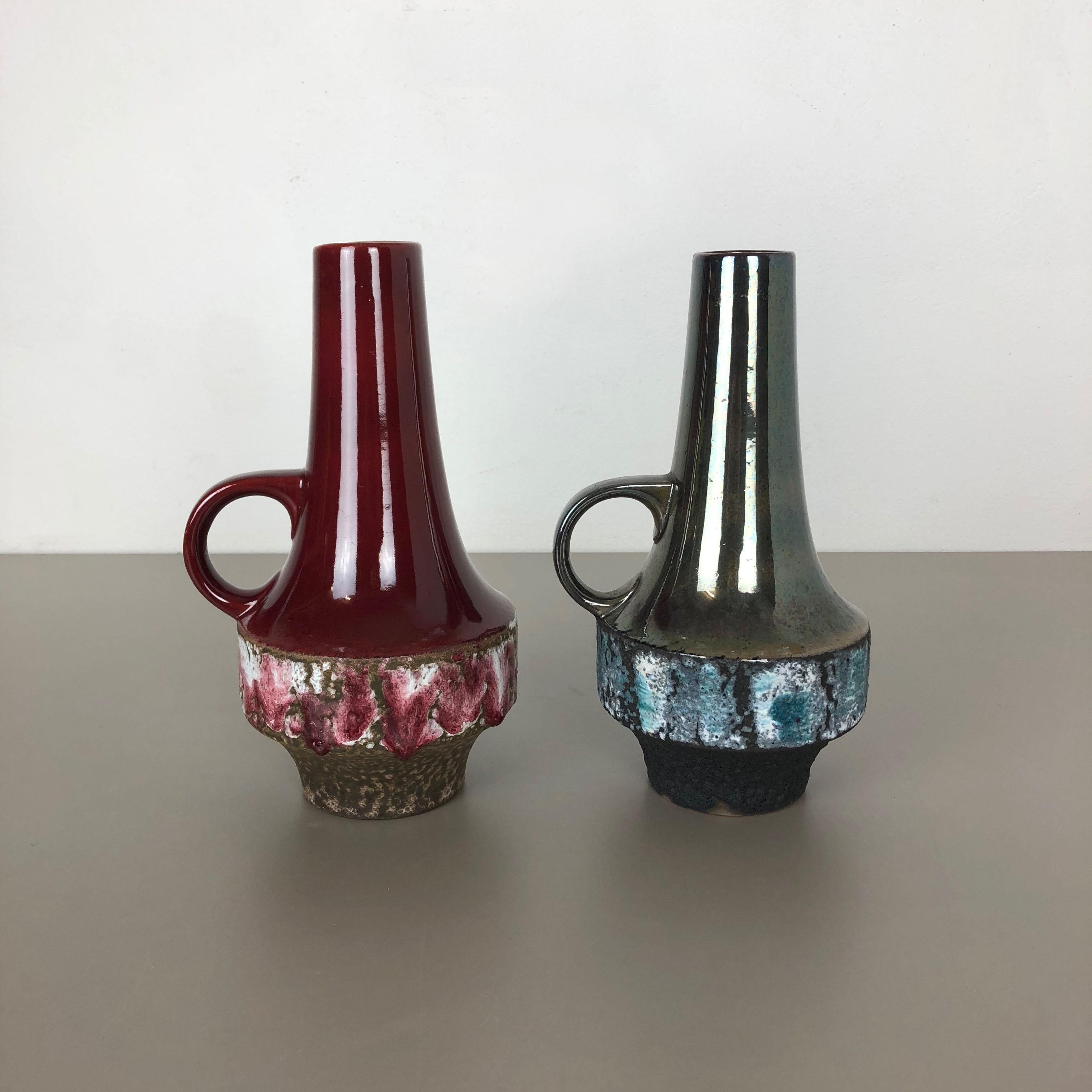 Article:

Ceramic pottery vase set of 2


Origin:

Germany


Designer:

Heinz Siery


Producer:

Carstens Tönnieshof, Germany


Decade:

1970s


This original vintage Pottery Object was designed by Heinz Siery and produced