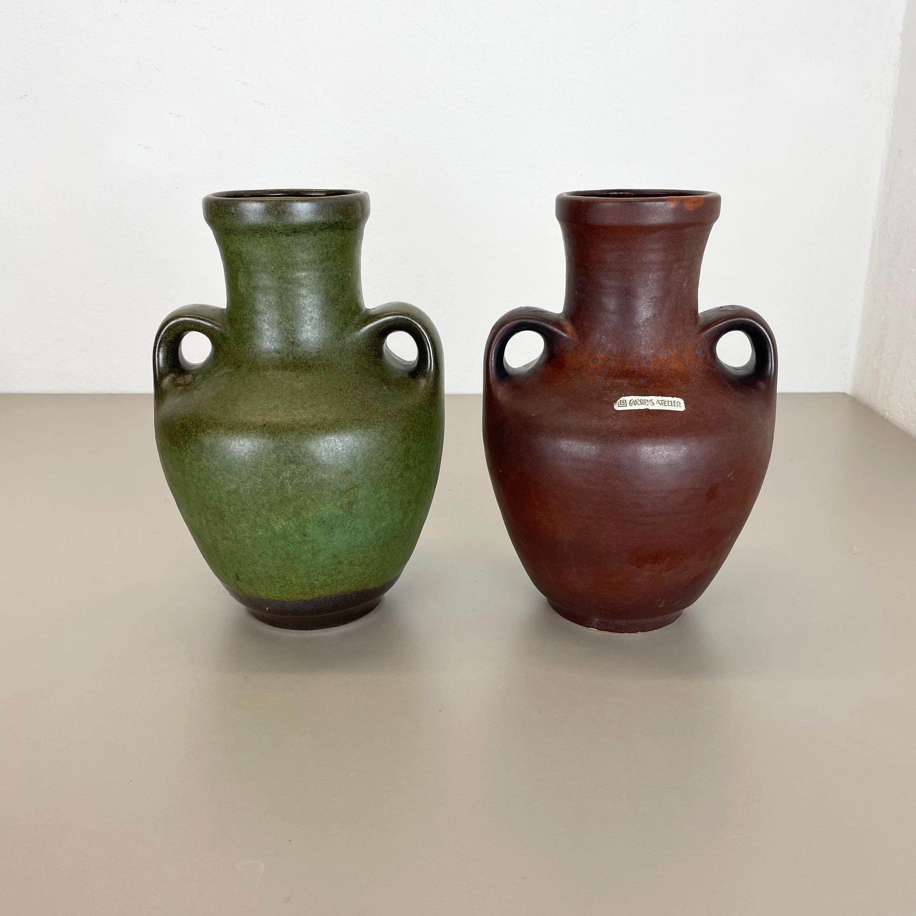 Article:

Ceramic pottery vase set of 2


Origin:

Germany


Designer:

Heinz Siery


Producer:

Carstens Tönnieshof, Germany


Decade:

1970s


This original vintage Pottery Object was designed by Heinz Siery and produced