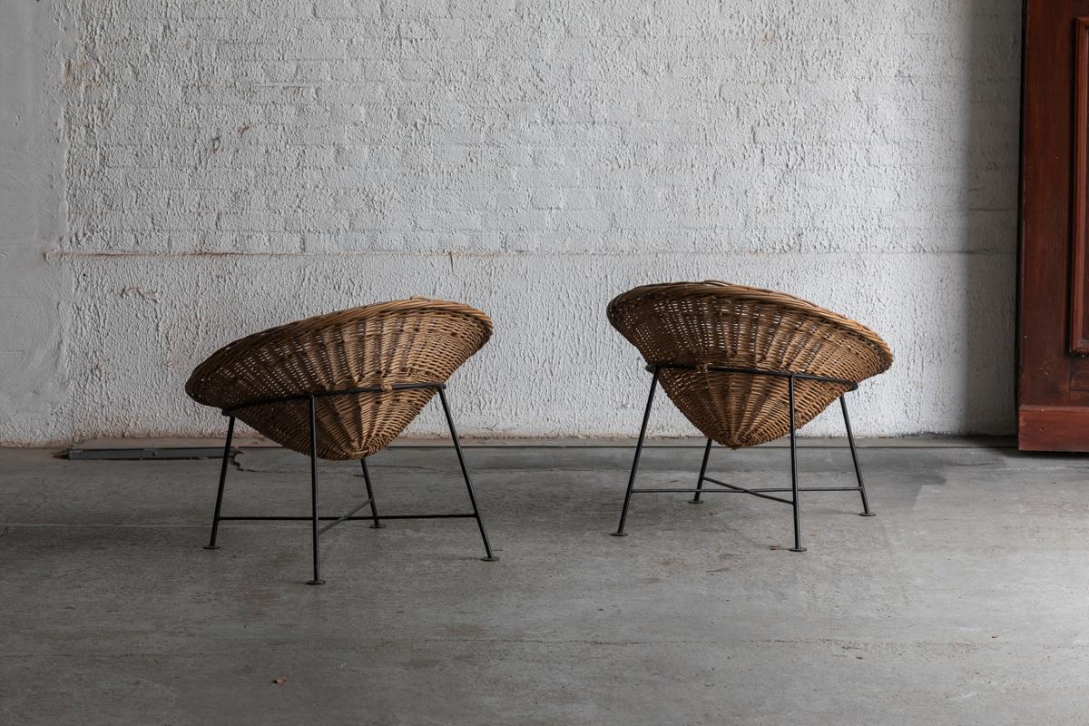 French Set of 2 circular rattan basket lounge chairs, France, 1960s