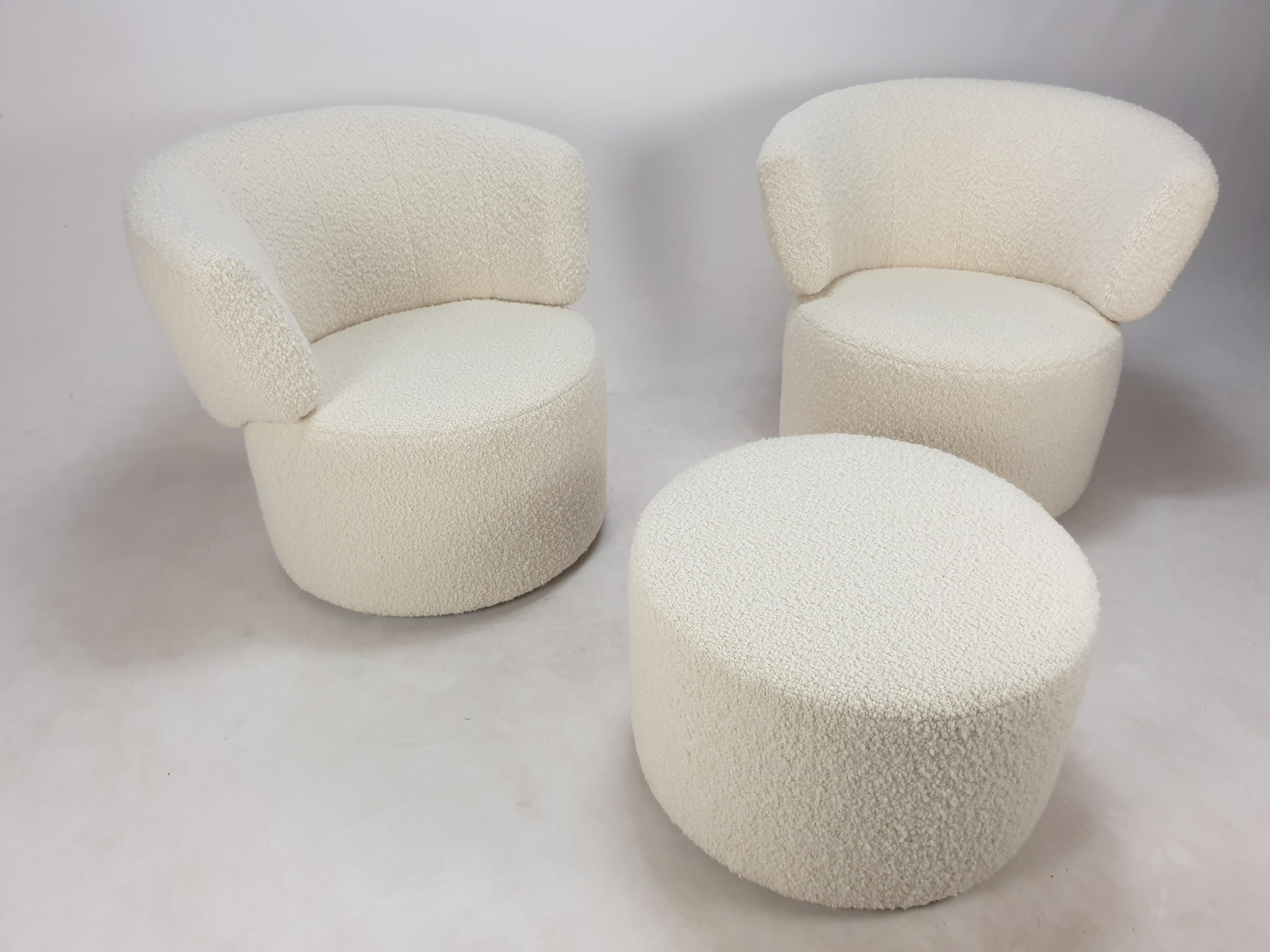Lovely set of two club chairs and one pouf, manufactured by Rolf Benz Germany.

This Rolf Benz set is very solid and is made with the best materials.
The comfortable chairs have a turning back system.

The set is just reupholstered with very