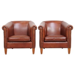 Ensemble de 2 fauteuils club en cuir de vache