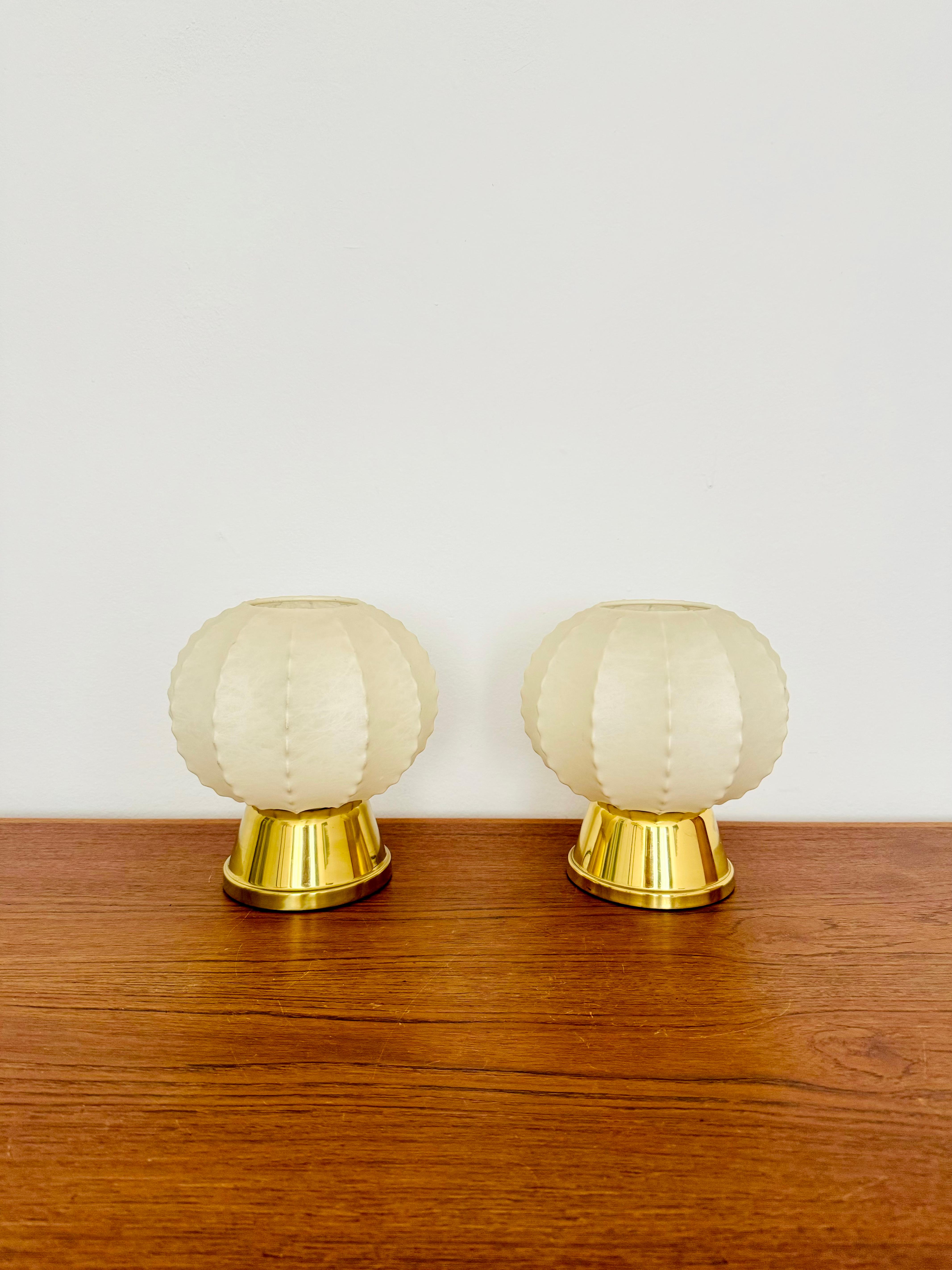 Very nice Cocoon table lamps from the 1960s. 
The beautiful structure creates a warm and very cozy light.
Wonderful design and an asset to any home.

Condition: 

Very good vintage condition with slight signs of age-related wear. 
The Cocoon