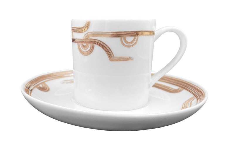 Description: Coffee cup with saucer (2 pieces)
Color: Beige gold
Size: 5.5 Ø x 5.5 H cm, 80 ml
Material: Porcelain and gold
Collection: Art Déco Garden

Larger quantities available upon request, with 8 weeks production time.