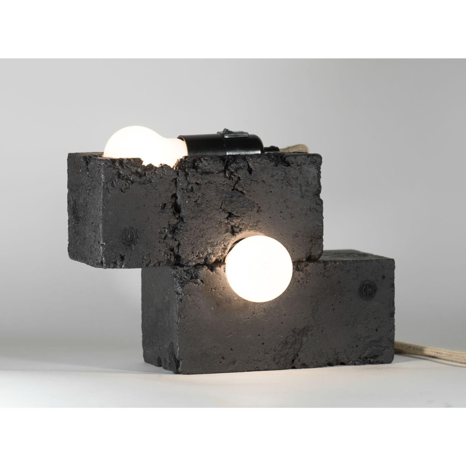Set of 2 Cofit 20's pendant light by Atelier Haute Cuisine
Dimensions: 10 x 10 x 22 cm 
Materials: Concrete

All our lamps can be wired according to each country. If sold to the USA it will be wired for the USA for instance.
 
The design wears the
