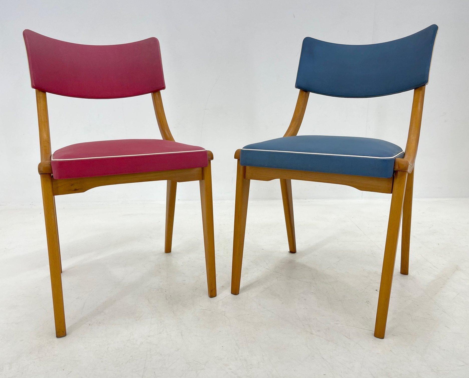 Set of two vintage German chairs in red and blue colour. 
All imperfections are visible in the photos.