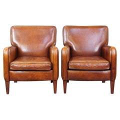 Set of 2 comfortable, stylish armchairs made of sheepskin with beautiful finish